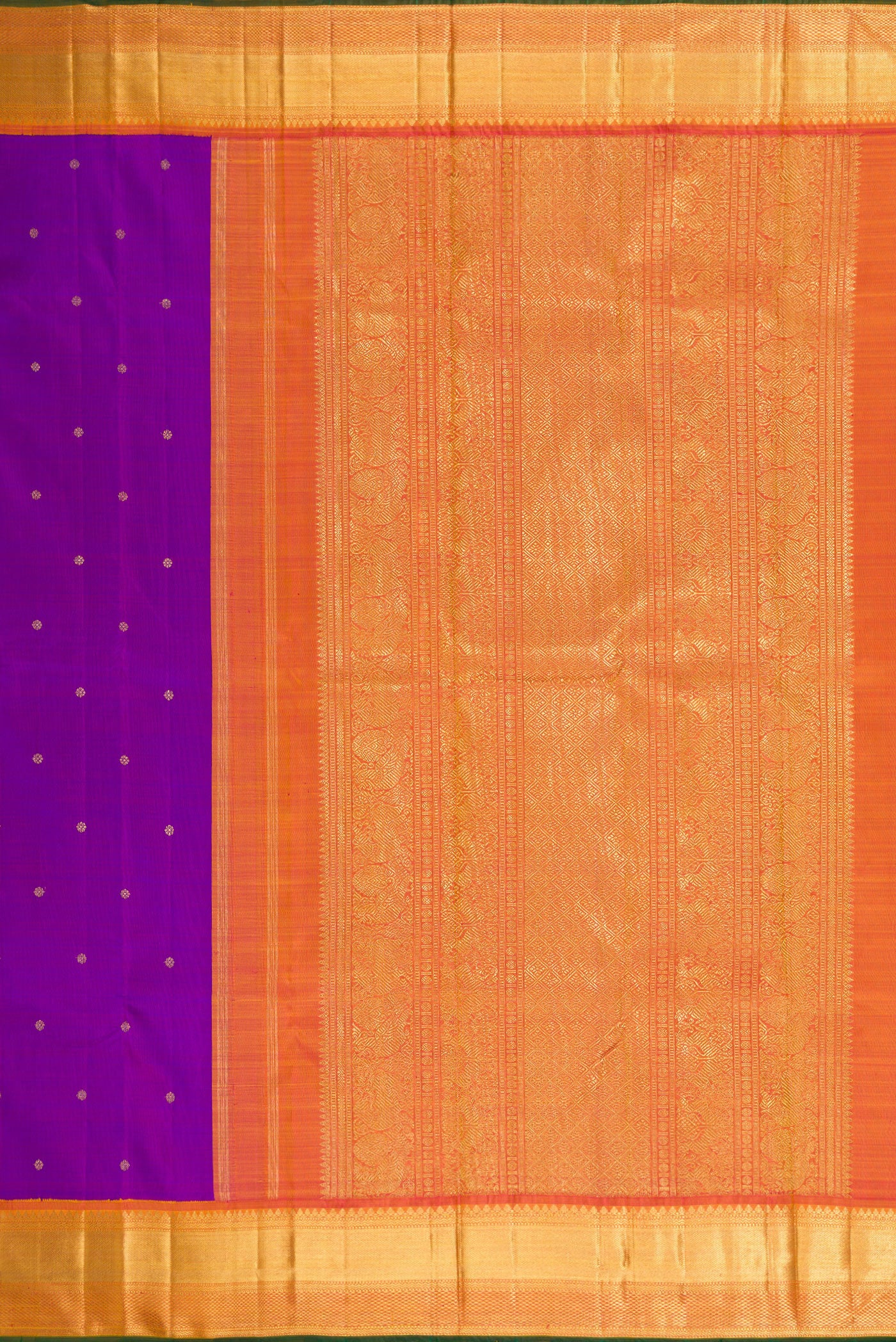 Close up image of the pallu of Pure Silk Pure Zari Purple Dual Tone Kanjivaram Saree with Zari Butta on the body and Zari Border. 