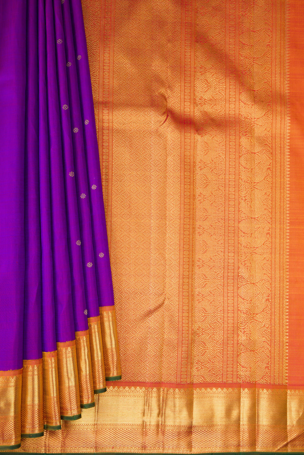 Pleats and pallu of Pure Silk Pure Zari Purple Dual Tone Kanjivaram Saree with Zari Butta on the body and Zari Border. 