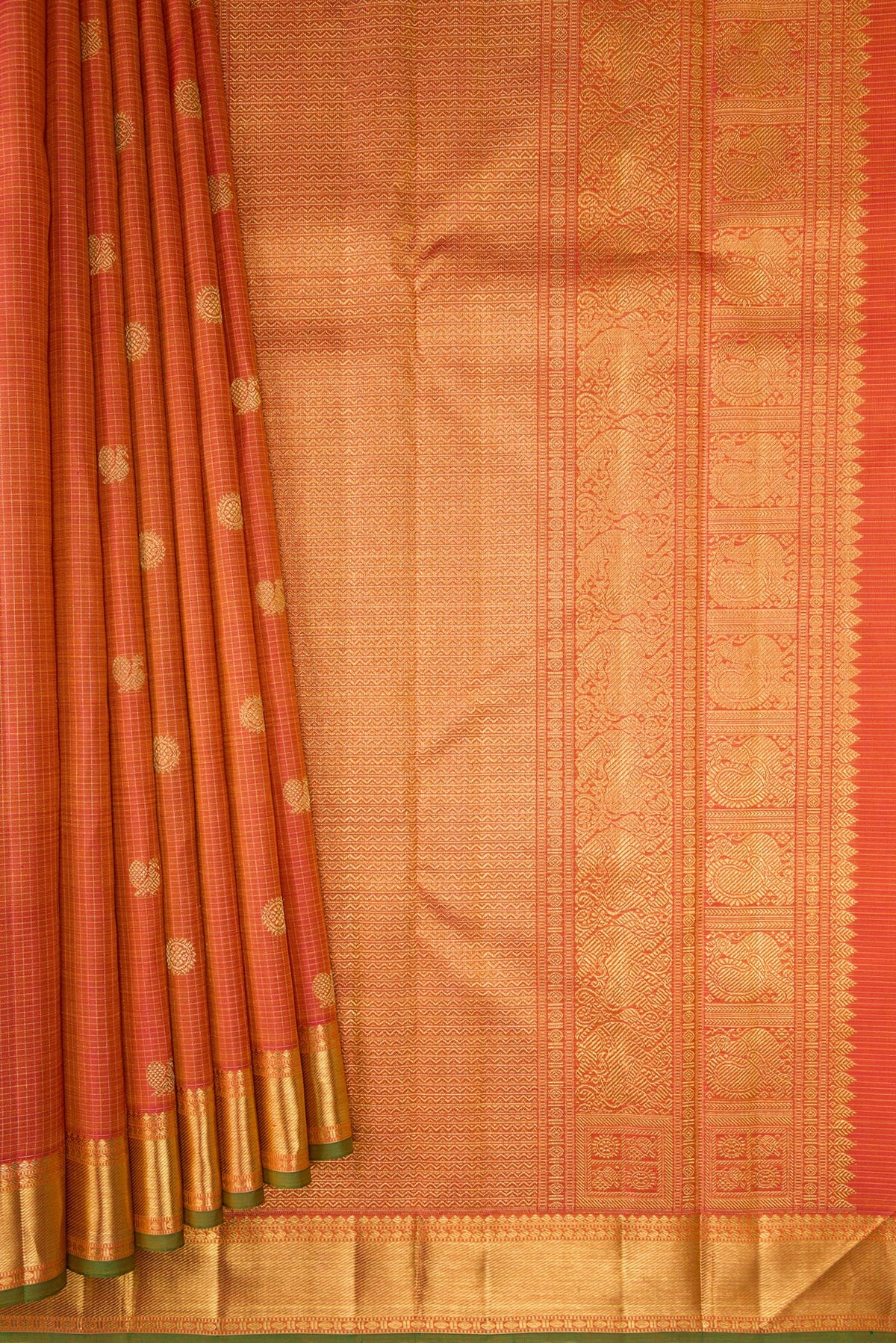 Pleats and pallu of Pure Silk Pure Zari Pinkish Yellow Dual Tone Kanjivaram Saree with Checked design on the body and Zari Border. 