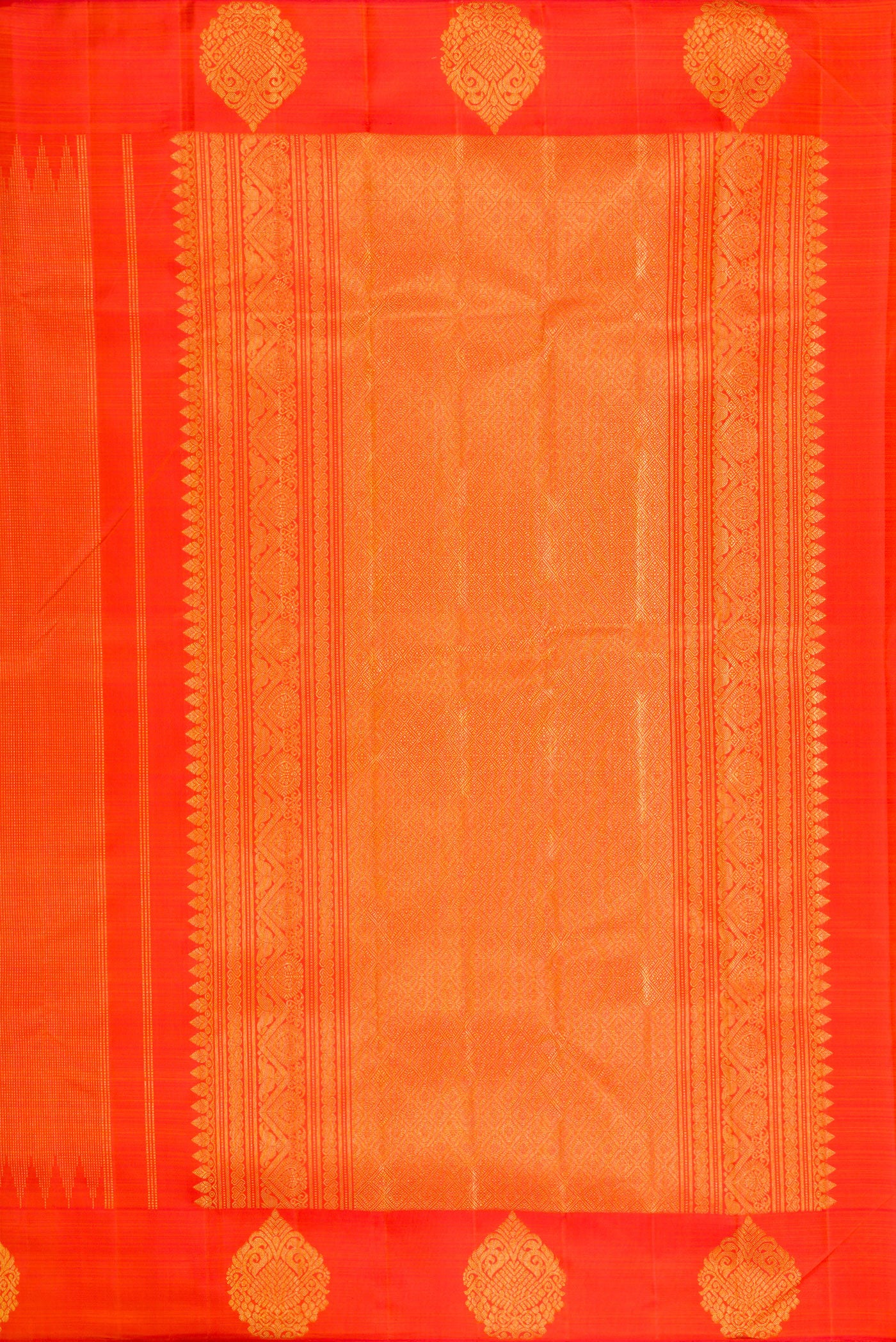 Close up image of the pallu of Orange Kanjivaram Silk Saree with Stripes on the body and Fancy Border. 