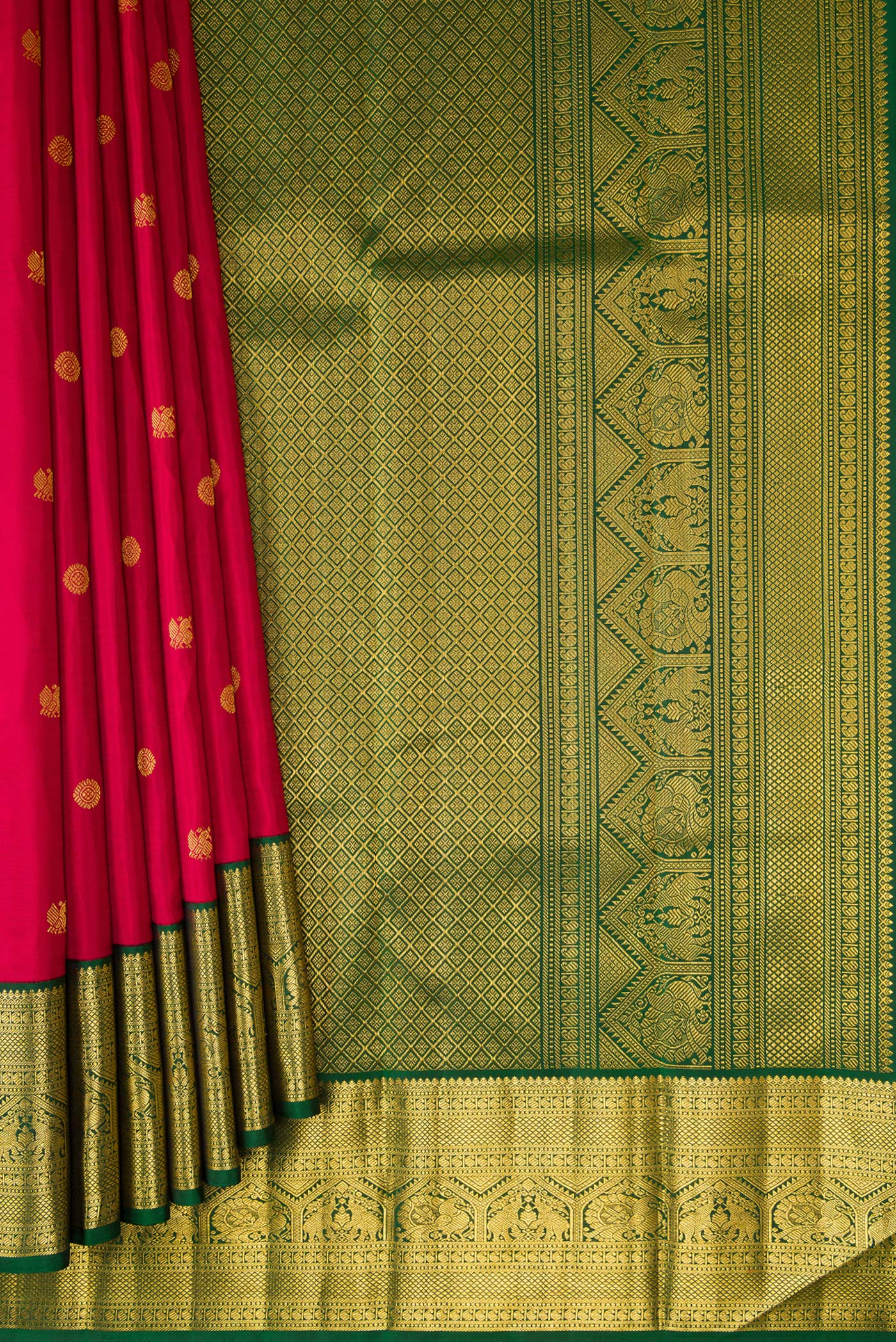 Pleats and pallu of Red Kanchipuram Silk Saree with Zari Butta on the body and Zari Border. 