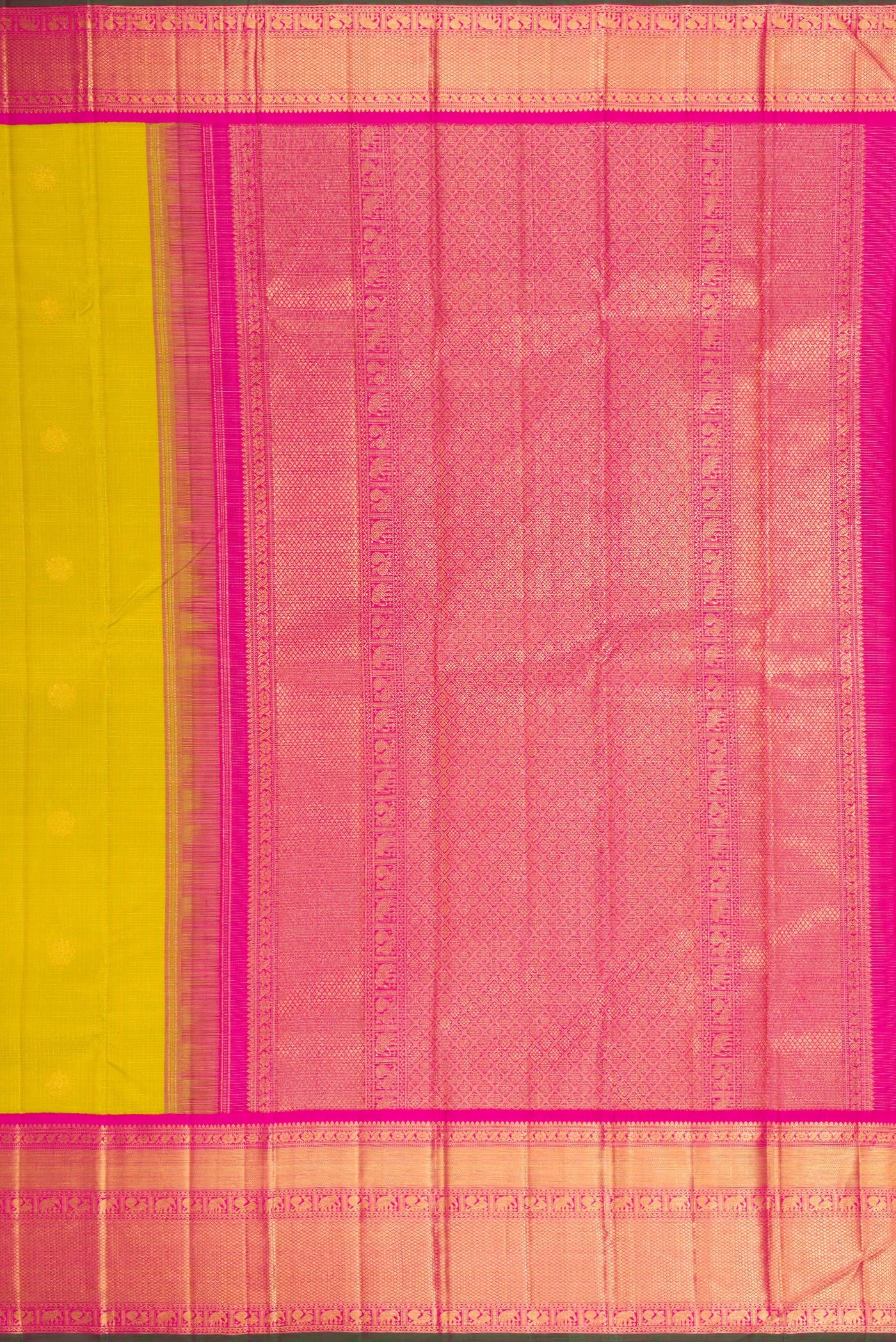 Close up image of the pallu of Parrot Green Kanchipuram Silk Saree with Zari Butta on the body and Zari Border. 
