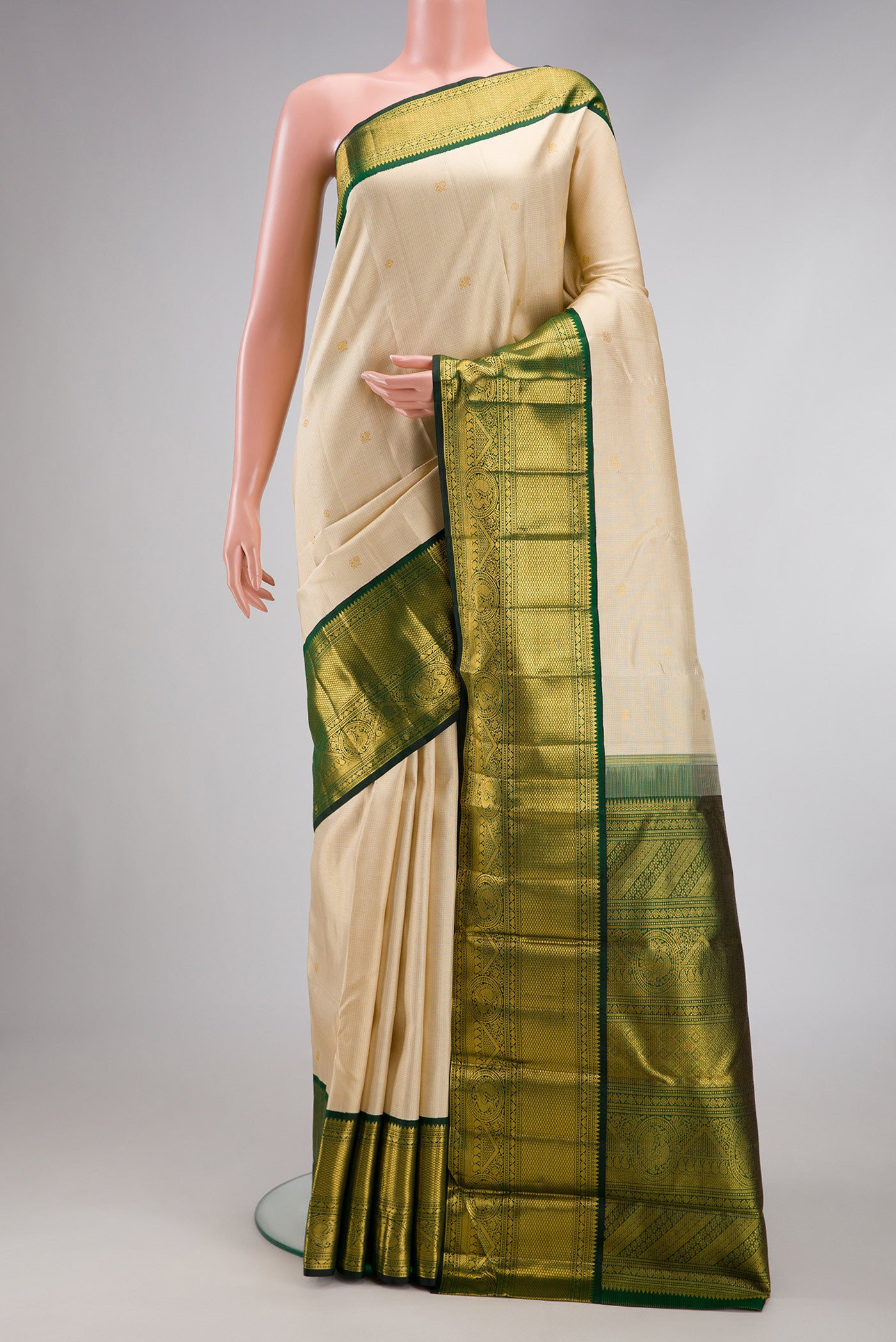 Sandal Dual Tone Kanchipuram Silk Saree with Checked design on the body and Zari Border.  displayed on a mannequin