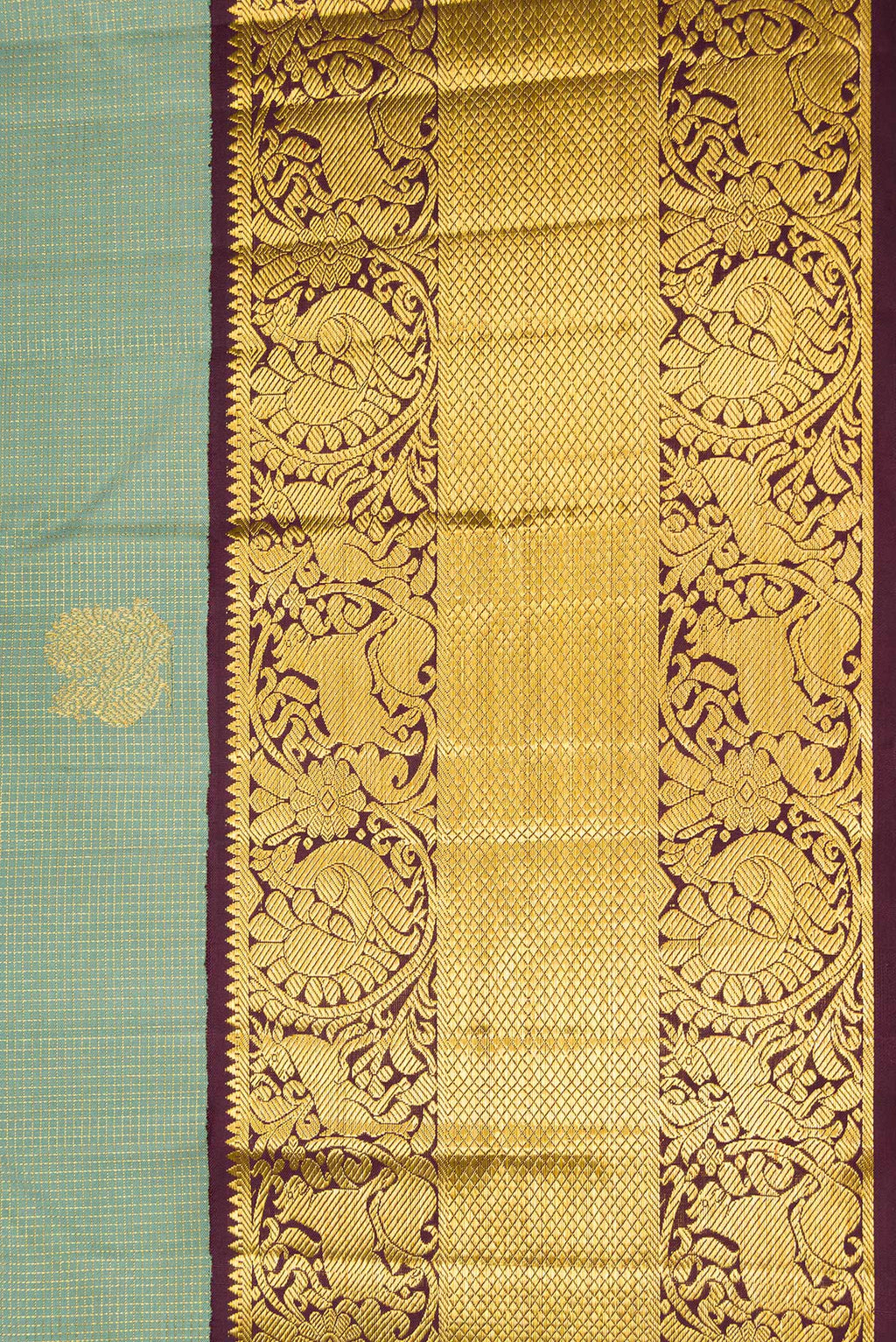 Border image of Green Dual Tone Kanchipuram Silk Saree with Checked design on the body and Fancy Border. 