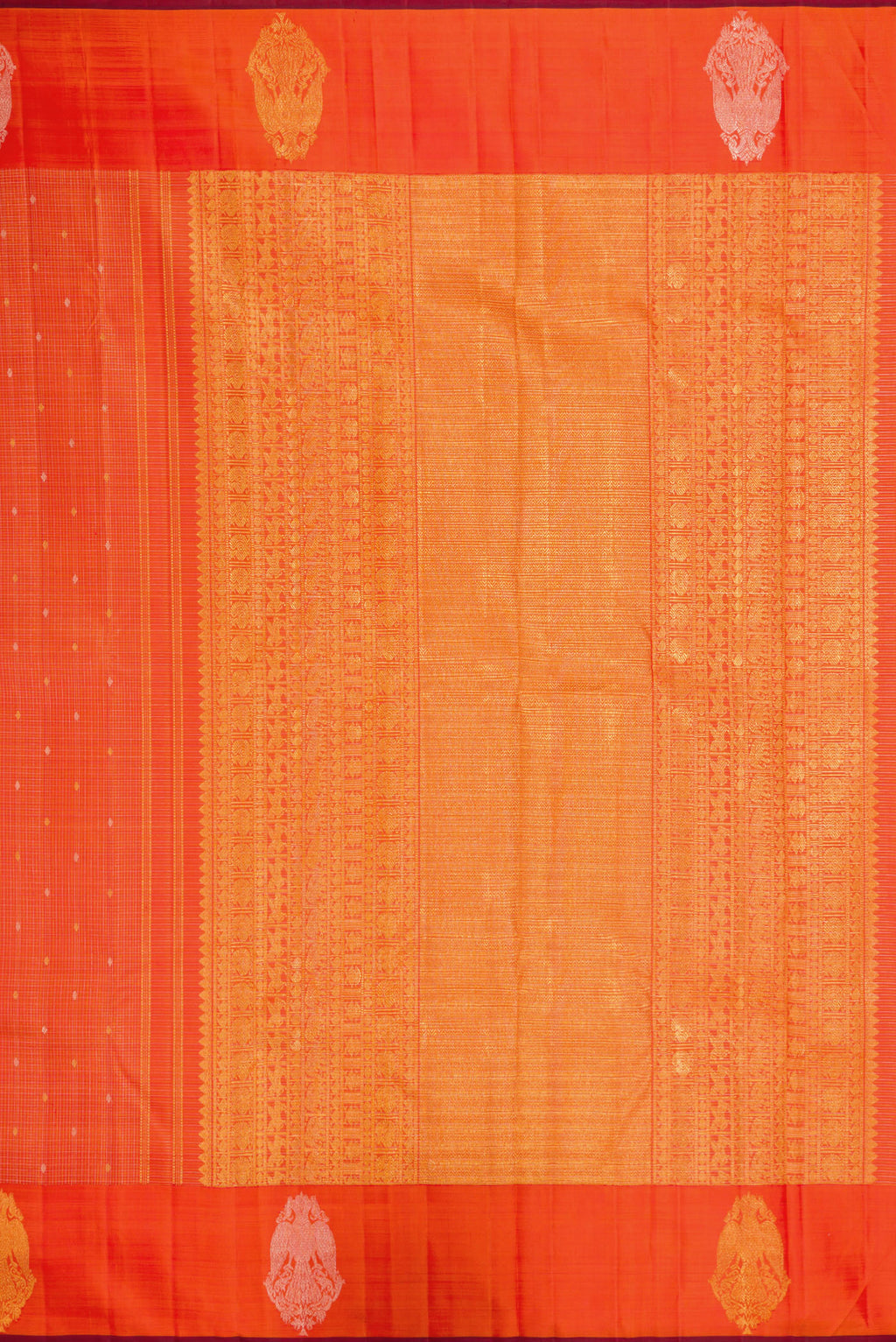 Close up image of the pallu of Orange Kanjivaram Silk Saree with Checked design on the body and Fancy Border. 