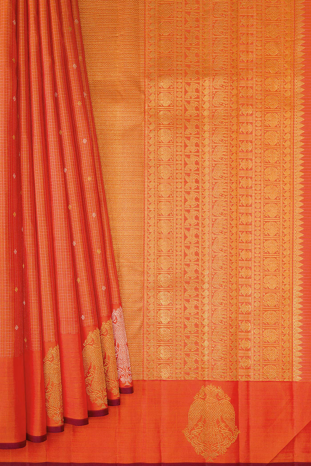 Pleats and pallu of Orange Kanjivaram Silk Saree with Checked design on the body and Fancy Border. 