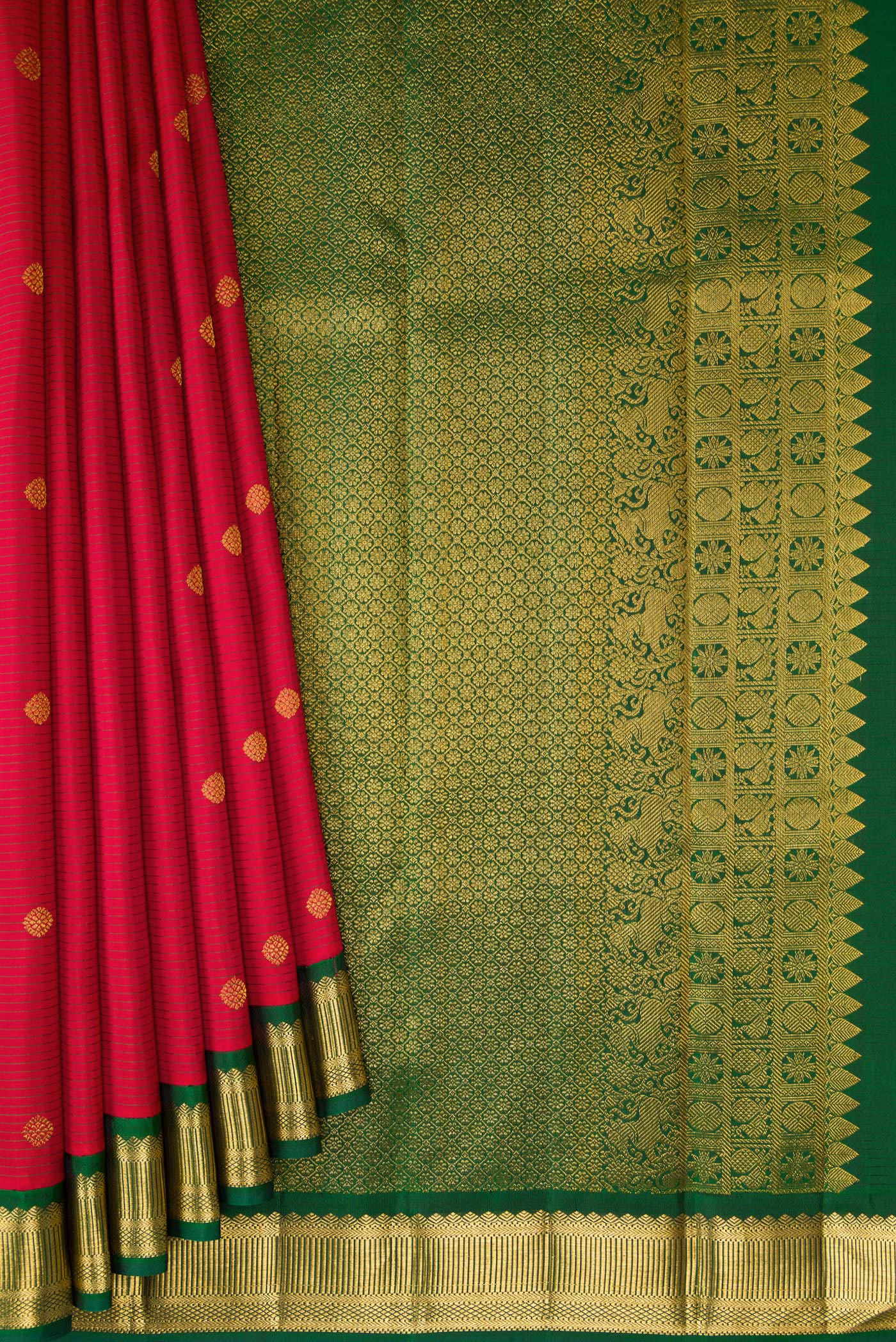 Pleats and pallu of Maroon Kanjivaram Silk Saree with Stripes on the body and Zari Border. 