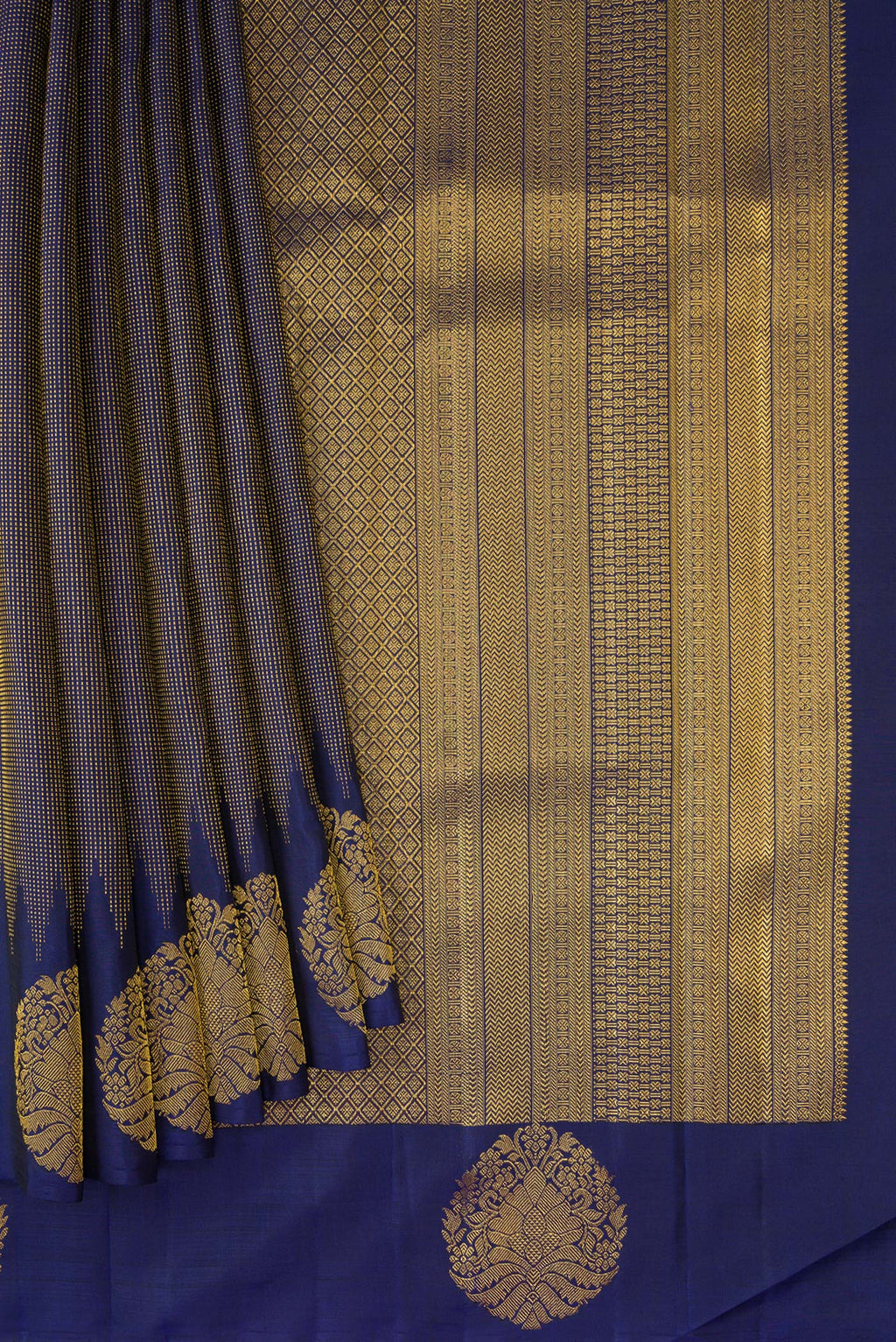 Pleats and pallu of Navy Blue Kanjivaram Silk Saree with Stripes on the body and Fancy Border. 