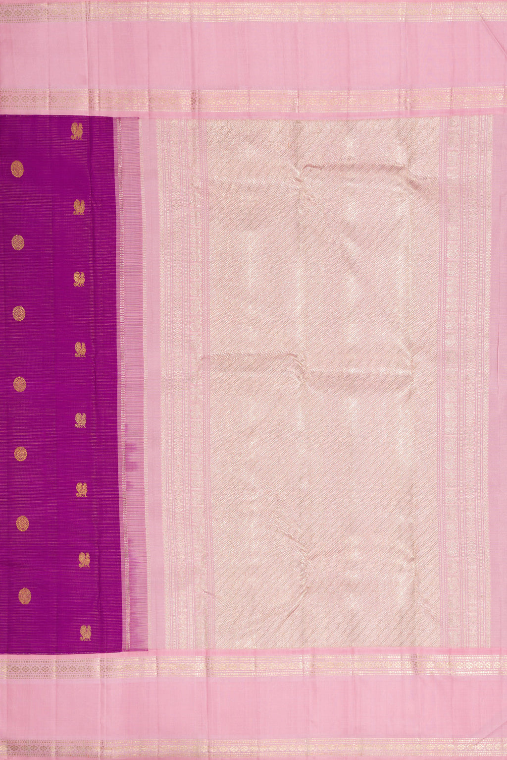Close up image of the pallu of Purple Dual Tone Kanchipuram Silk Saree with Zari Butta on the body and Zari Border. 
