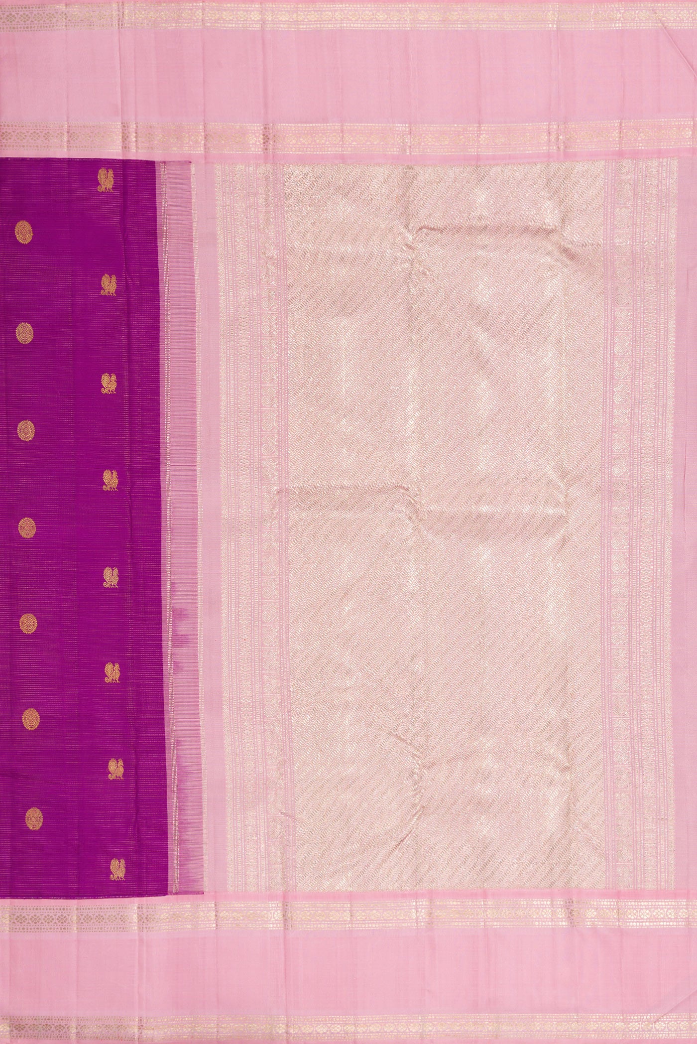 Close up image of the pallu of Purple Dual Tone Kanchipuram Silk Saree with Zari Butta on the body and Zari Border. 
