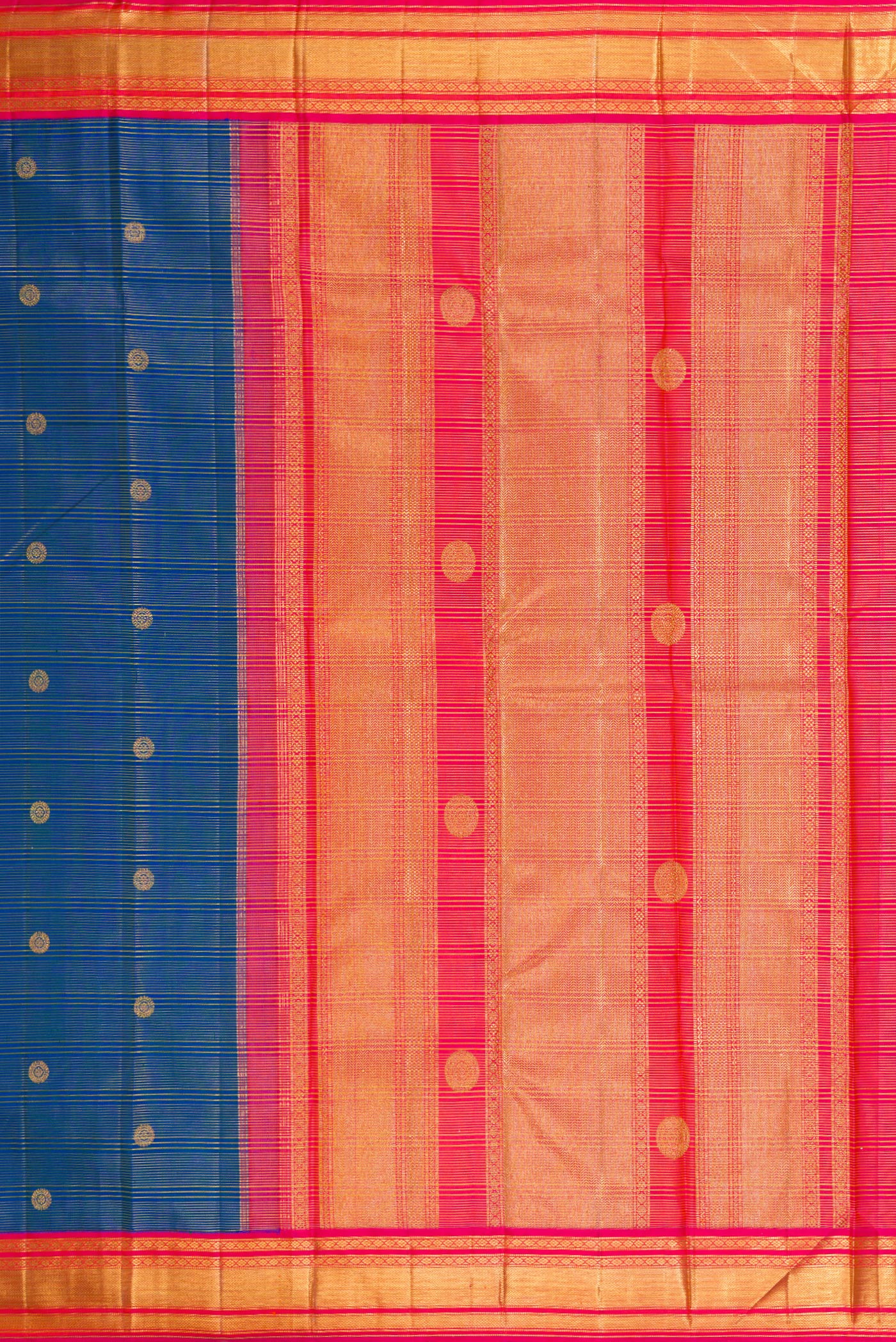 Close up image of the pallu of Peacock Blue Kanchipuram Silk Saree with Zari Butta on the body and Zari Border. 