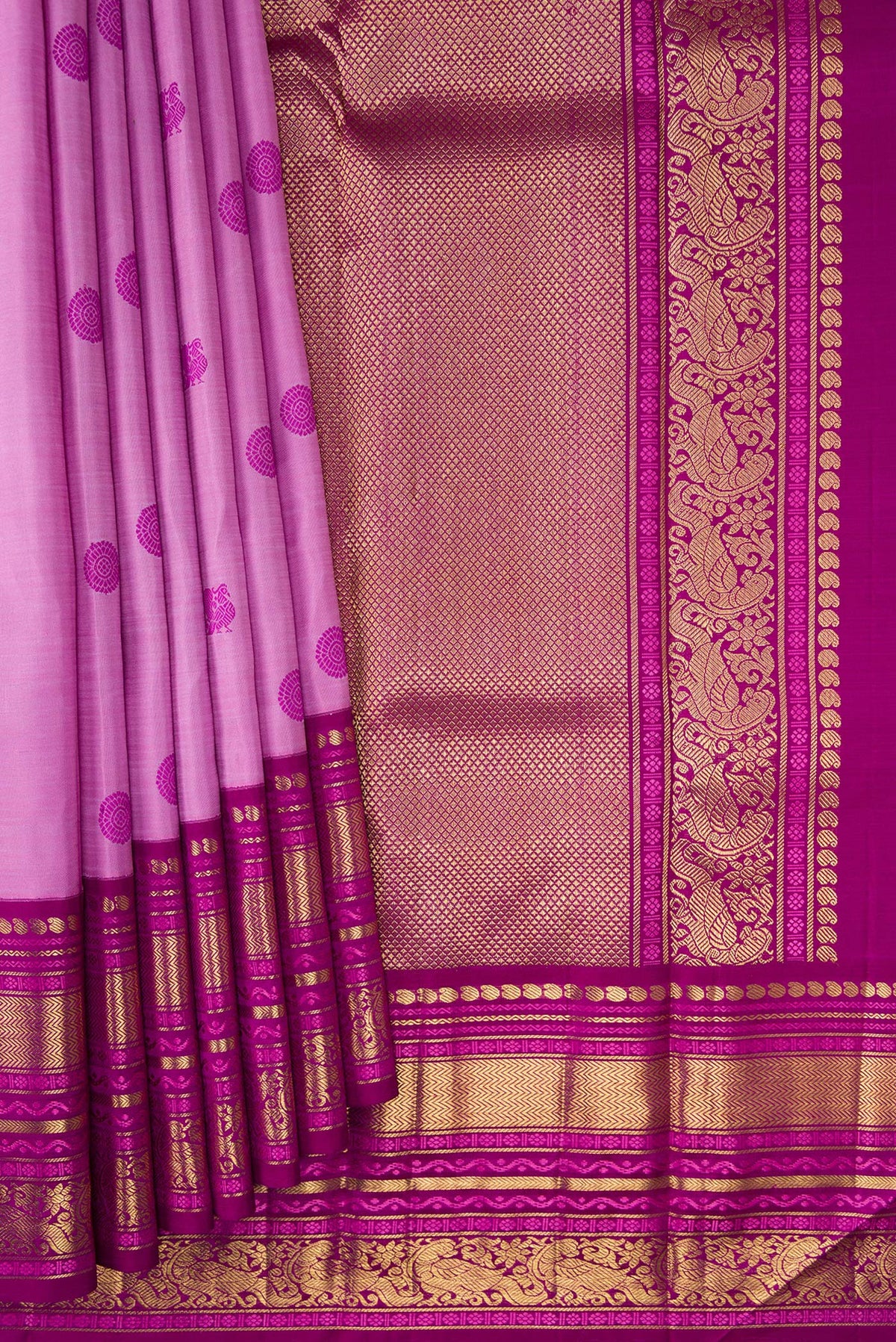 Pleats and pallu of Pure Silk Pure Zari Lavender Kanchipuram Saree with Thread Butta on the body and Zari Border. 