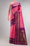 Pure Silk Pure Zari Pink Kanchipuram Saree with Thread Butta on the body and Zari Border.  displayed on a mannequin