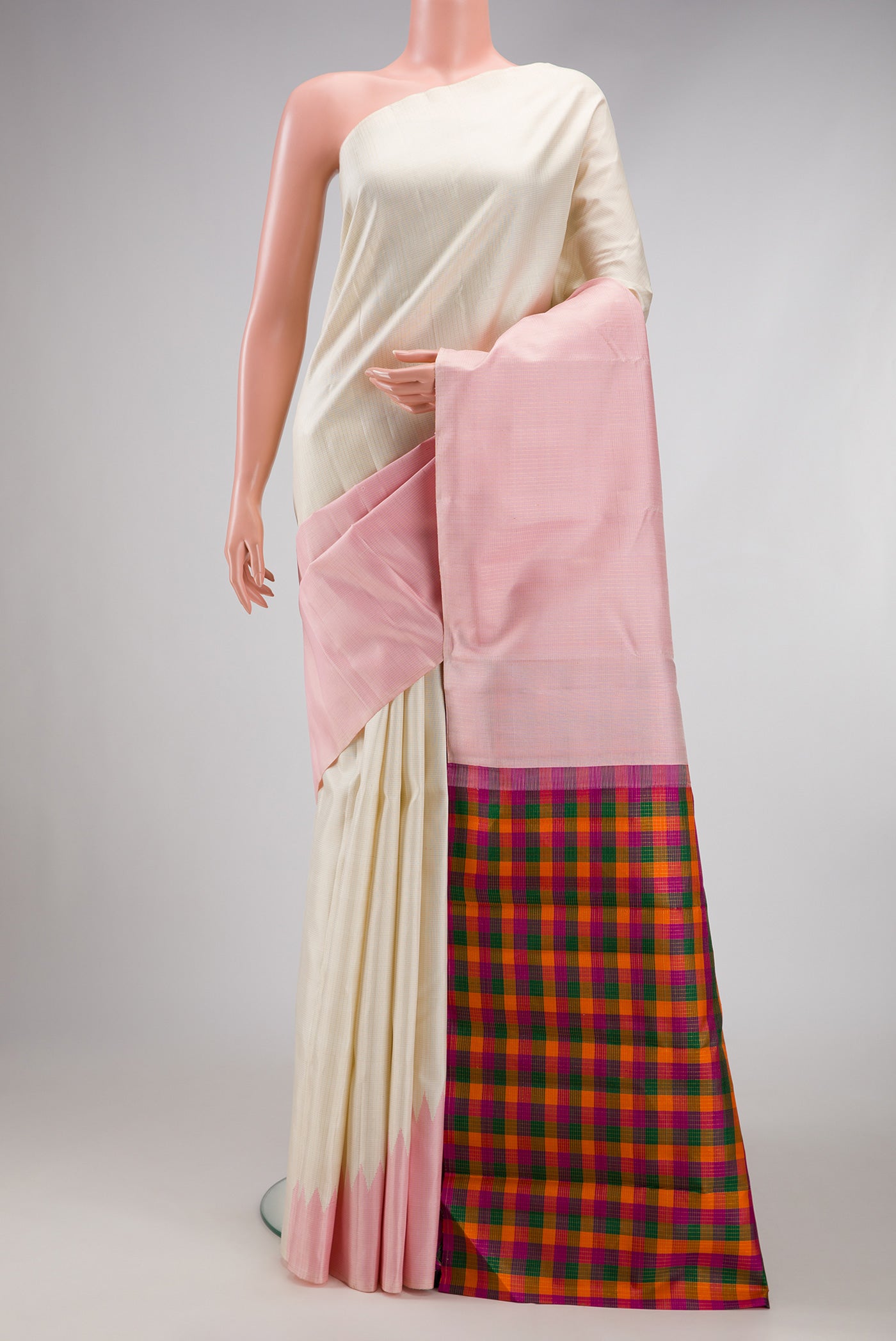 Off White Kanchipuram Silk Saree with Checked design on the body and Rising Temple Border.  displayed on a mannequin