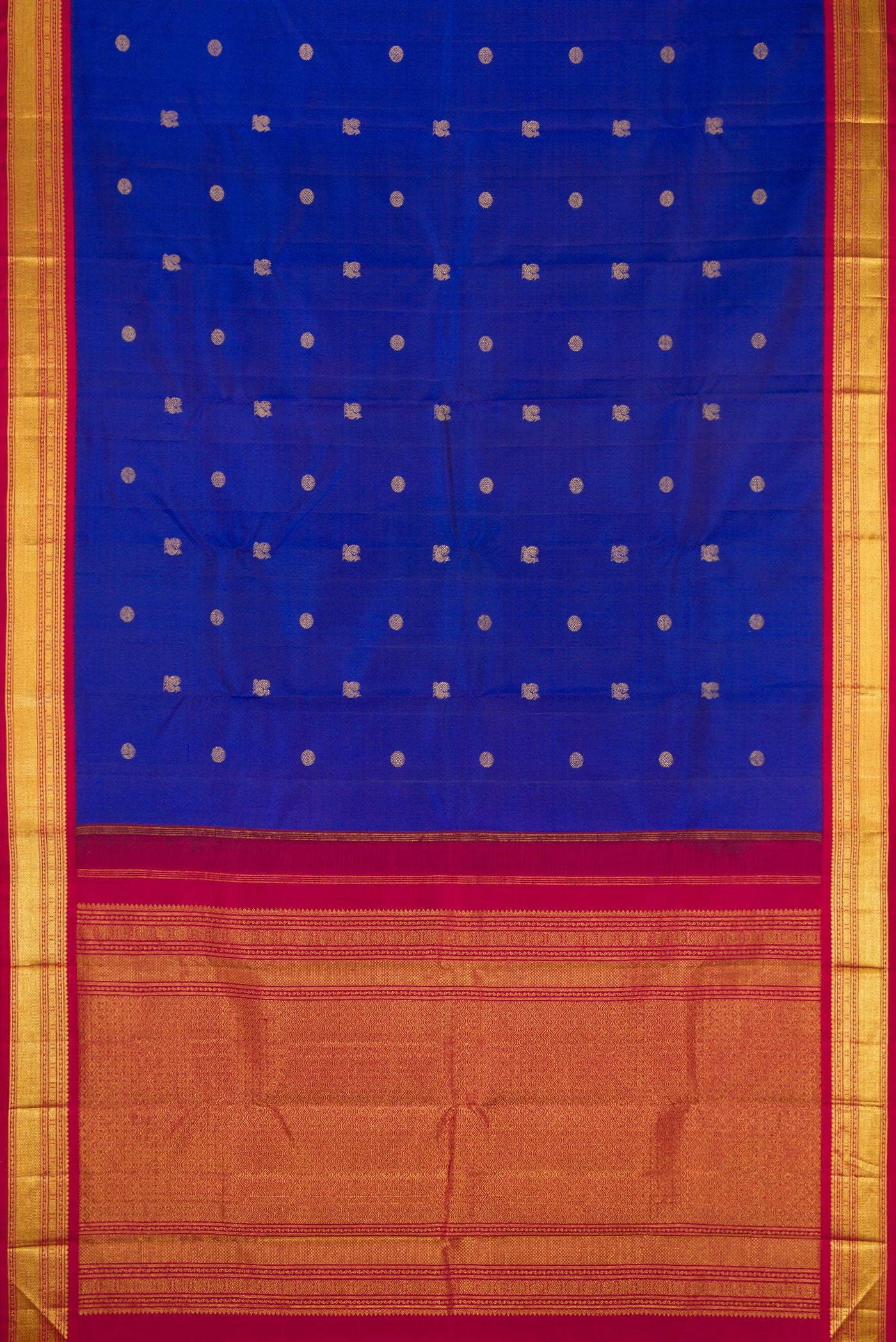 Flat view of Royal Blue Dual Tone Kanjivaram Silk Saree with Zari Butta on the body and Zari Border. 