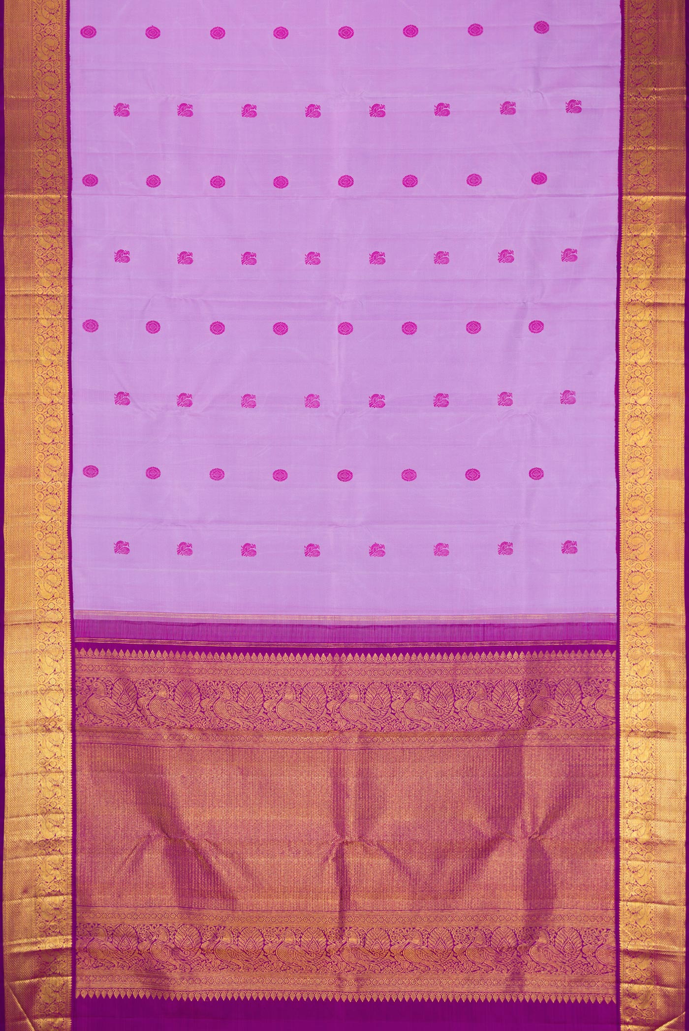 Flat view of Lavender Dual Tone Kanjivaram Silk Saree with Thread Butta on the body and Zari Border. 
