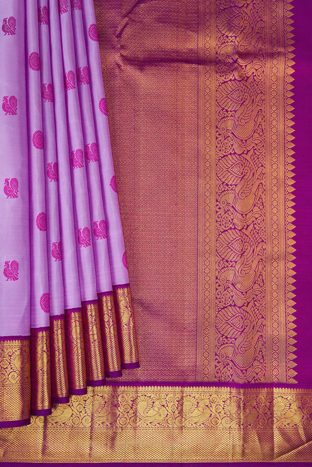 Pleats and pallu of Lavender Dual Tone Kanjivaram Silk Saree with Thread Butta on the body and Zari Border. 