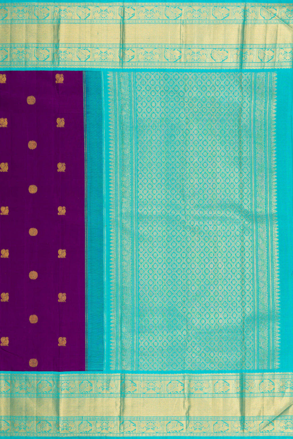 Close up image of the pallu of Purple Kanjivaram Silk Saree with Zari Butta on the body and Zari Border. 