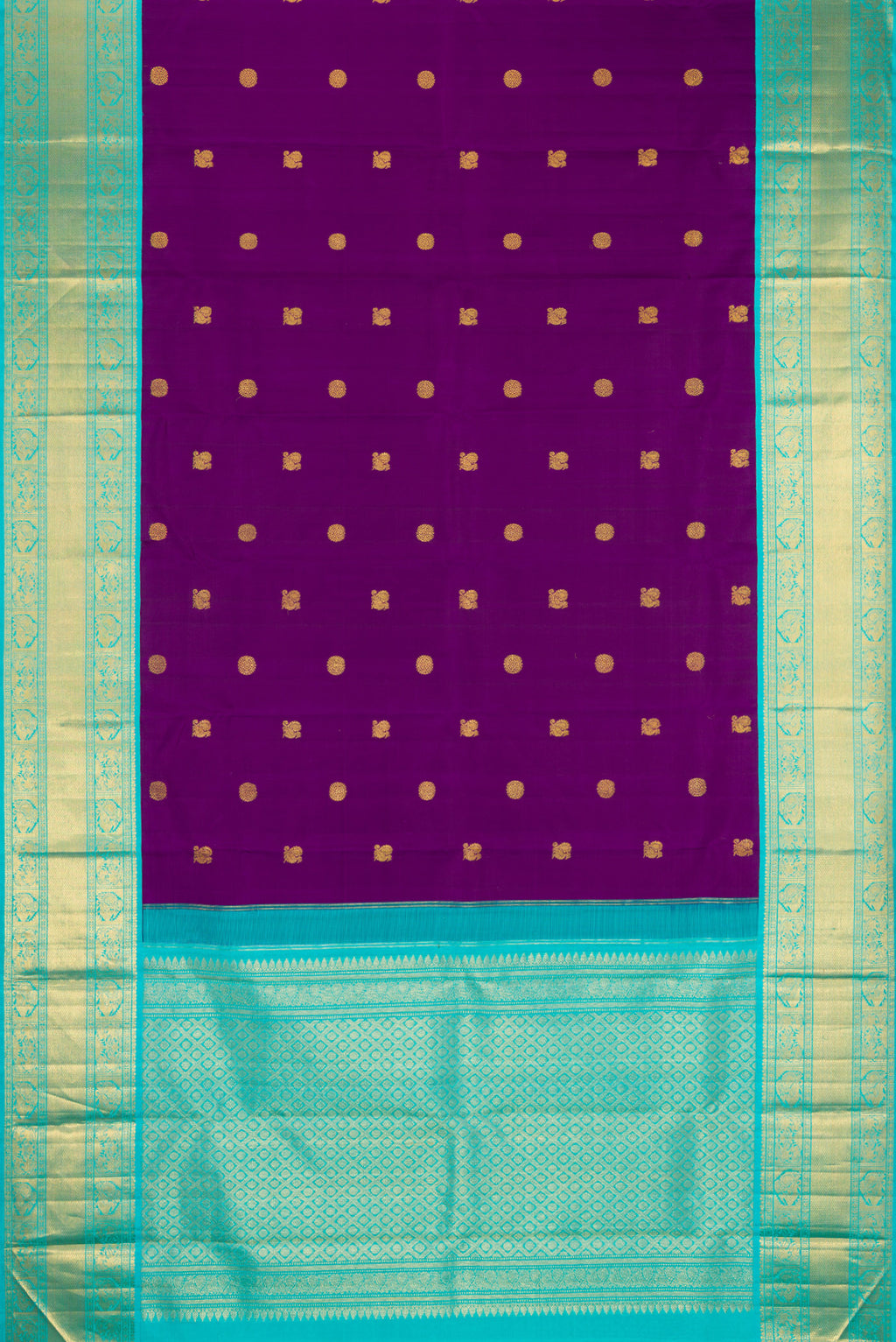 Flat view of Purple Kanjivaram Silk Saree with Zari Butta on the body and Zari Border. 
