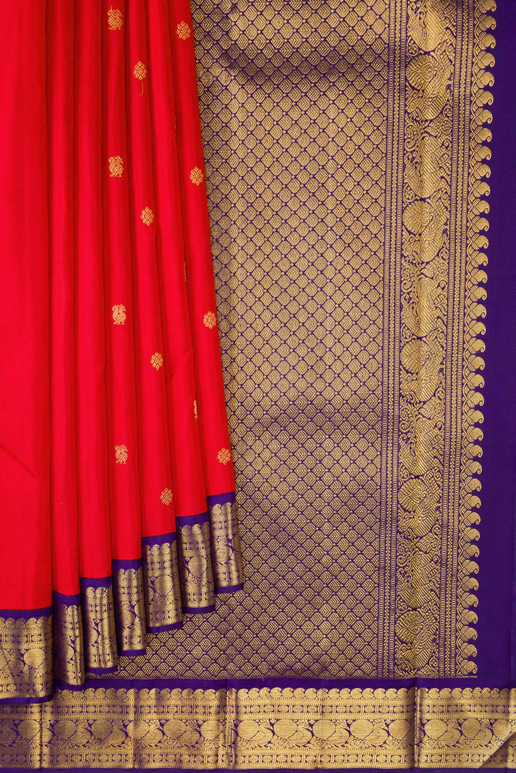 Pleats and pallu of Red Kanjivaram Silk Saree with Zari Butta on the body and Zari Border. 