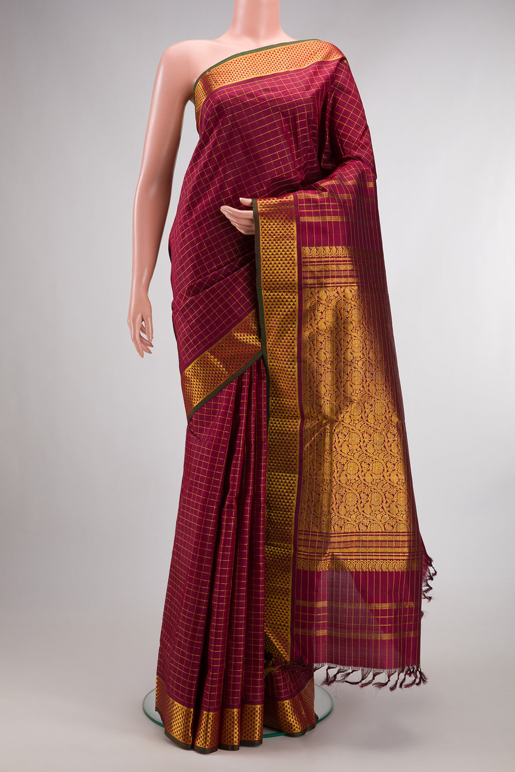 Pure Silk Maroon Kanchipuram Nine Yards Saree with Checked design on the body and Zari Border.  displayed on a mannequin