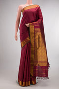 Pure Silk Maroon Kanchipuram Nine Yards Saree with Checked design on the body and Zari Border.  displayed on a mannequin