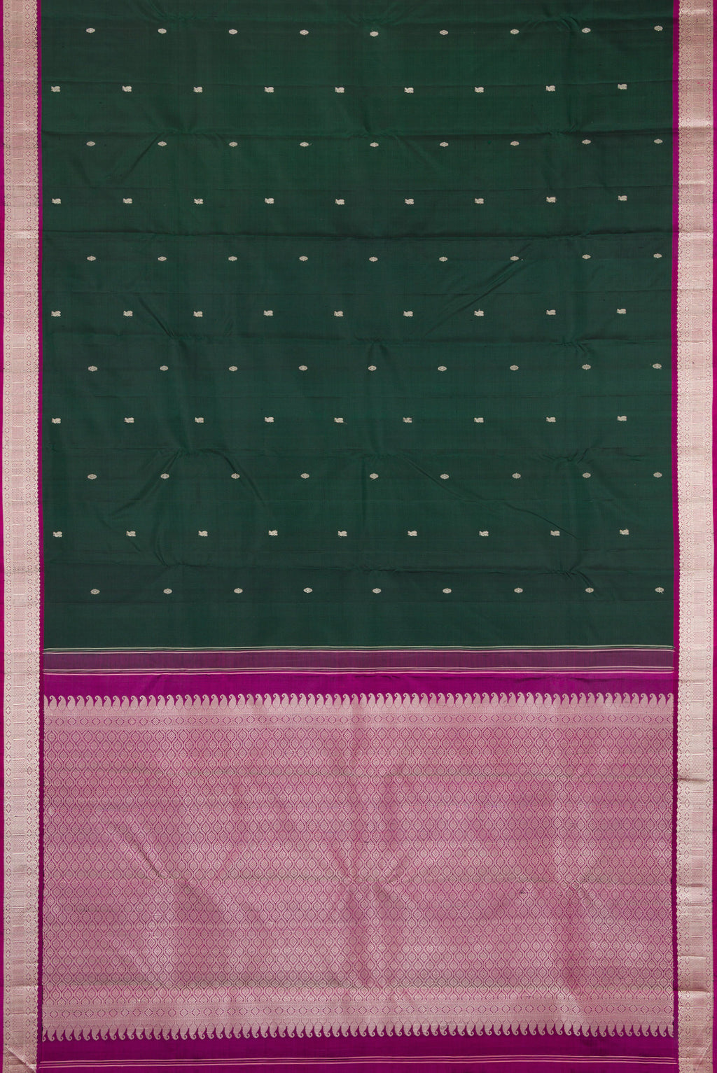 Flat view of Bottle Green Kanchipuram Silk Saree with Thread Butta on the body and Thread Border. 