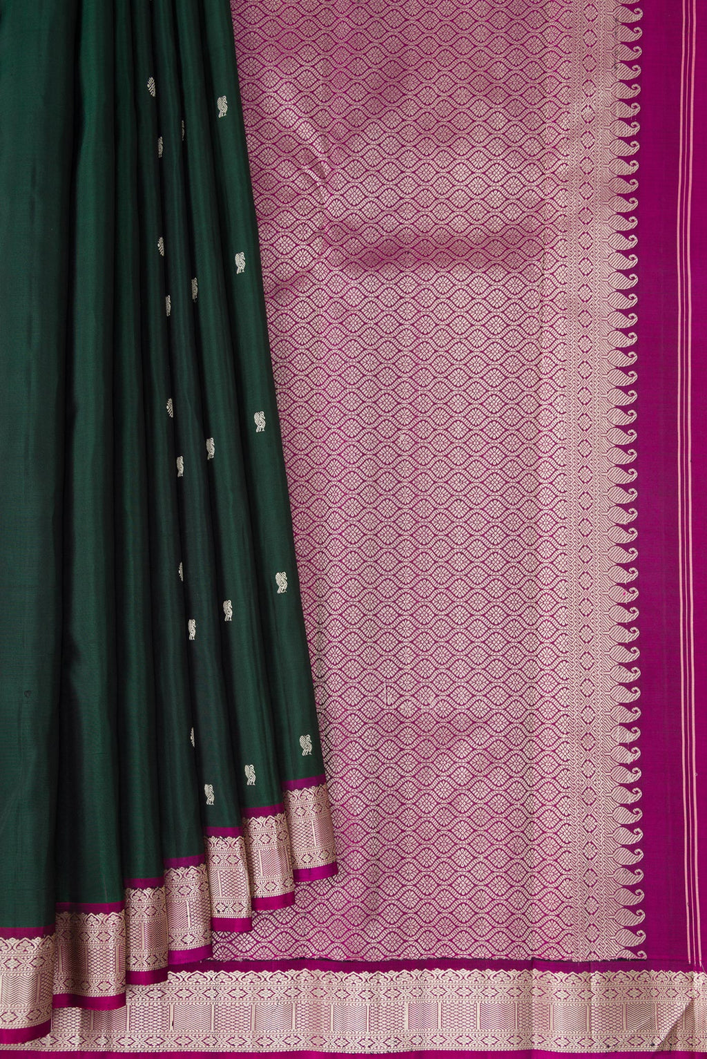Pleats and pallu of Bottle Green Kanchipuram Silk Saree with Thread Butta on the body and Thread Border. 