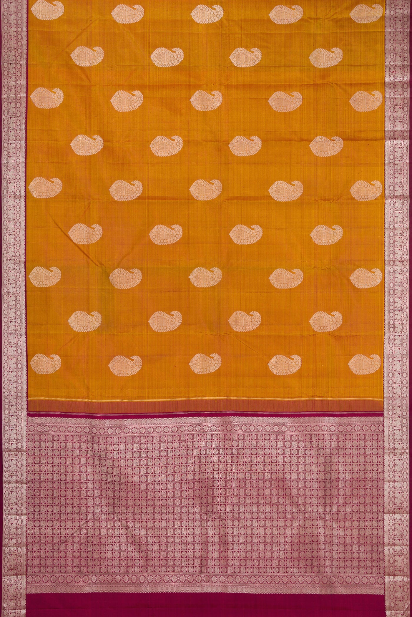 Flat view of Mustard Kanjivaram Silk Saree with Thread Butta on the body and Thread Border. 