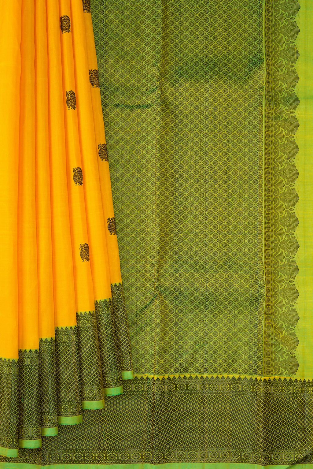 Pleats and pallu of Yellow Kanjivaram Silk Saree with Thread Butta on the body and Thread Border. 