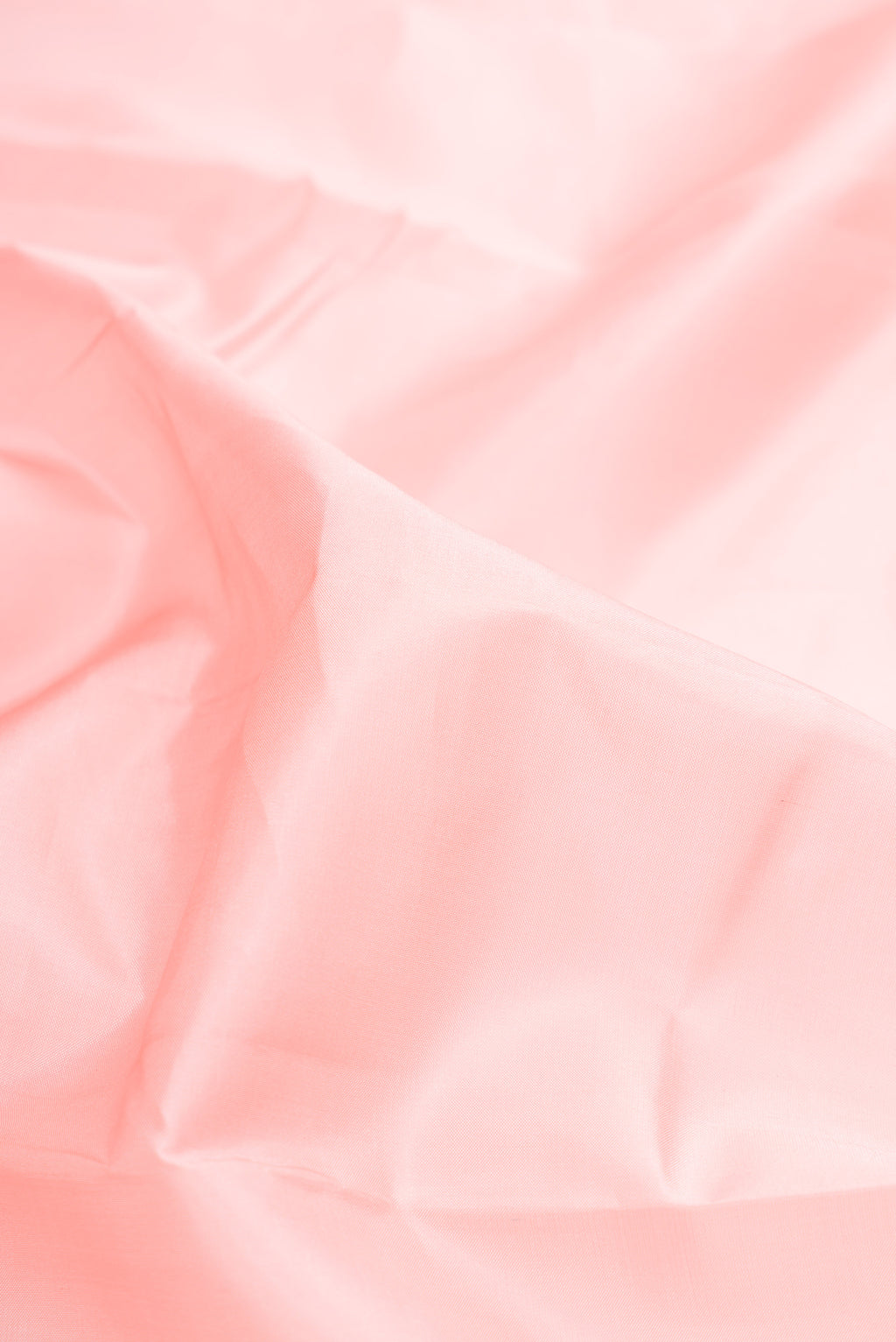 Close up of Pure Silk Peach Bangalore Nine Yards Saree with Plain Body and Temple Border.  displaying folds