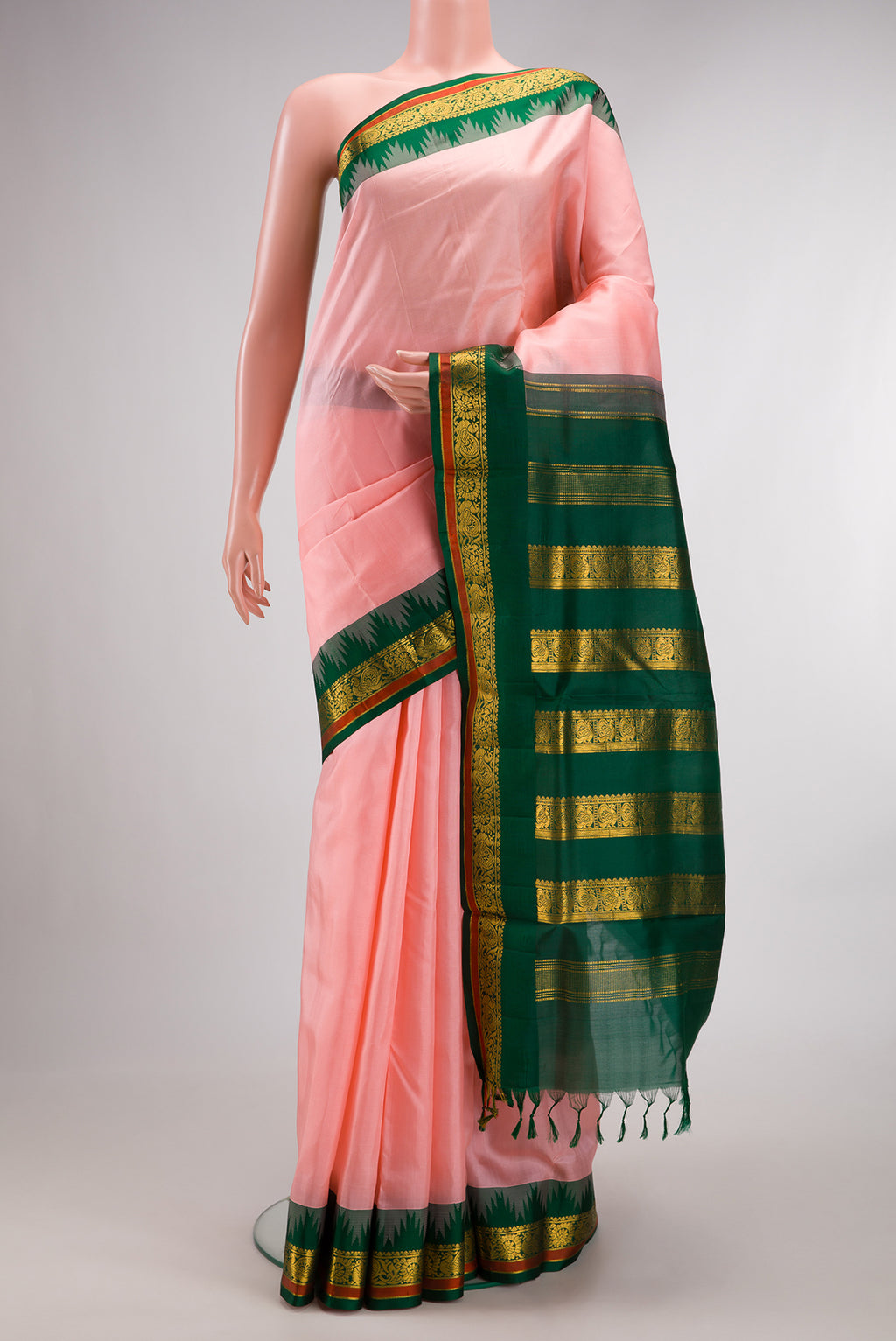 Pure Silk Peach Bangalore Nine Yards Saree with Plain Body and Temple Border.  displayed on a mannequin