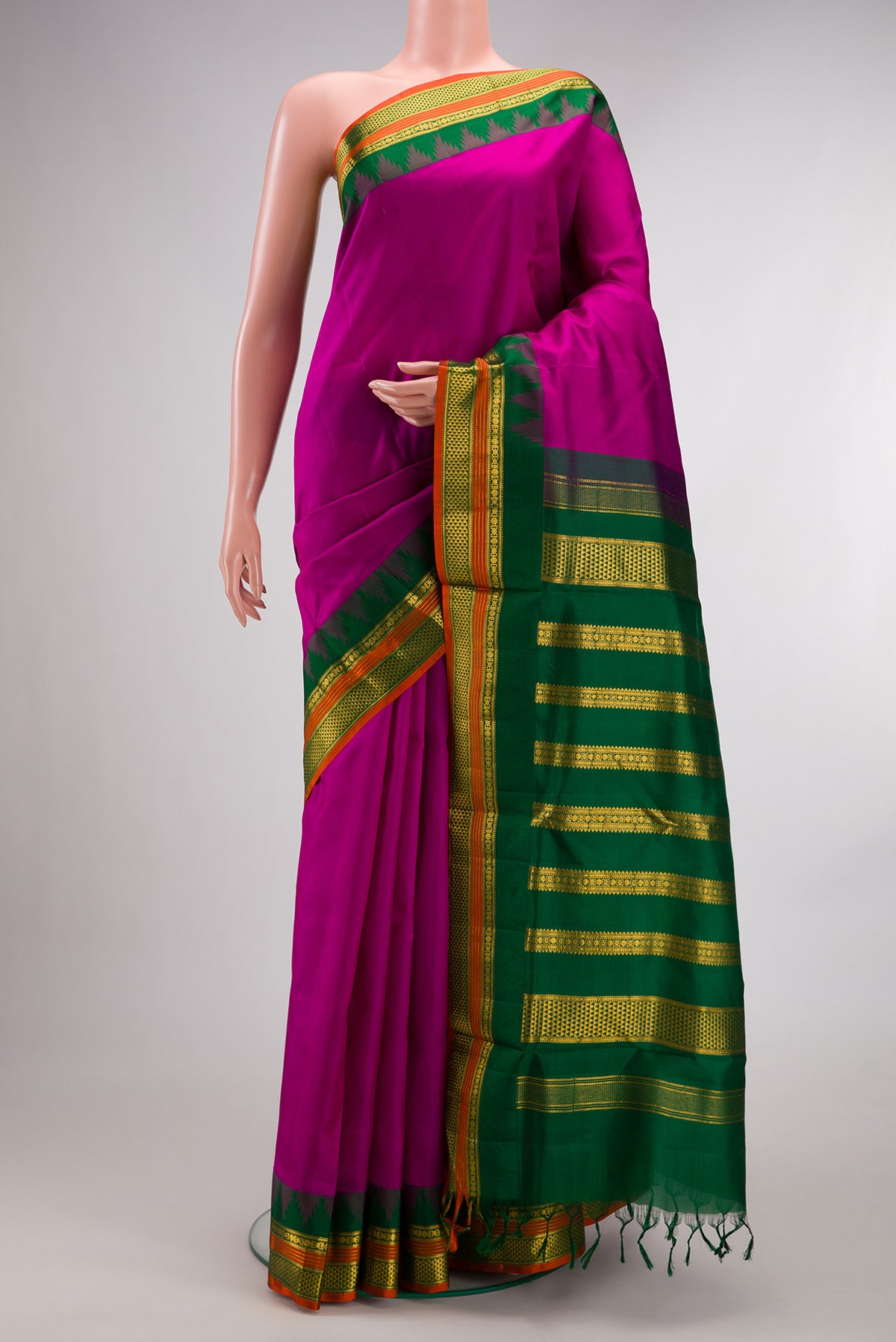 Pure Silk Magenta Kanjivaram Nine Yards Saree with Plain Body and Zari Border.  displayed on a mannequin