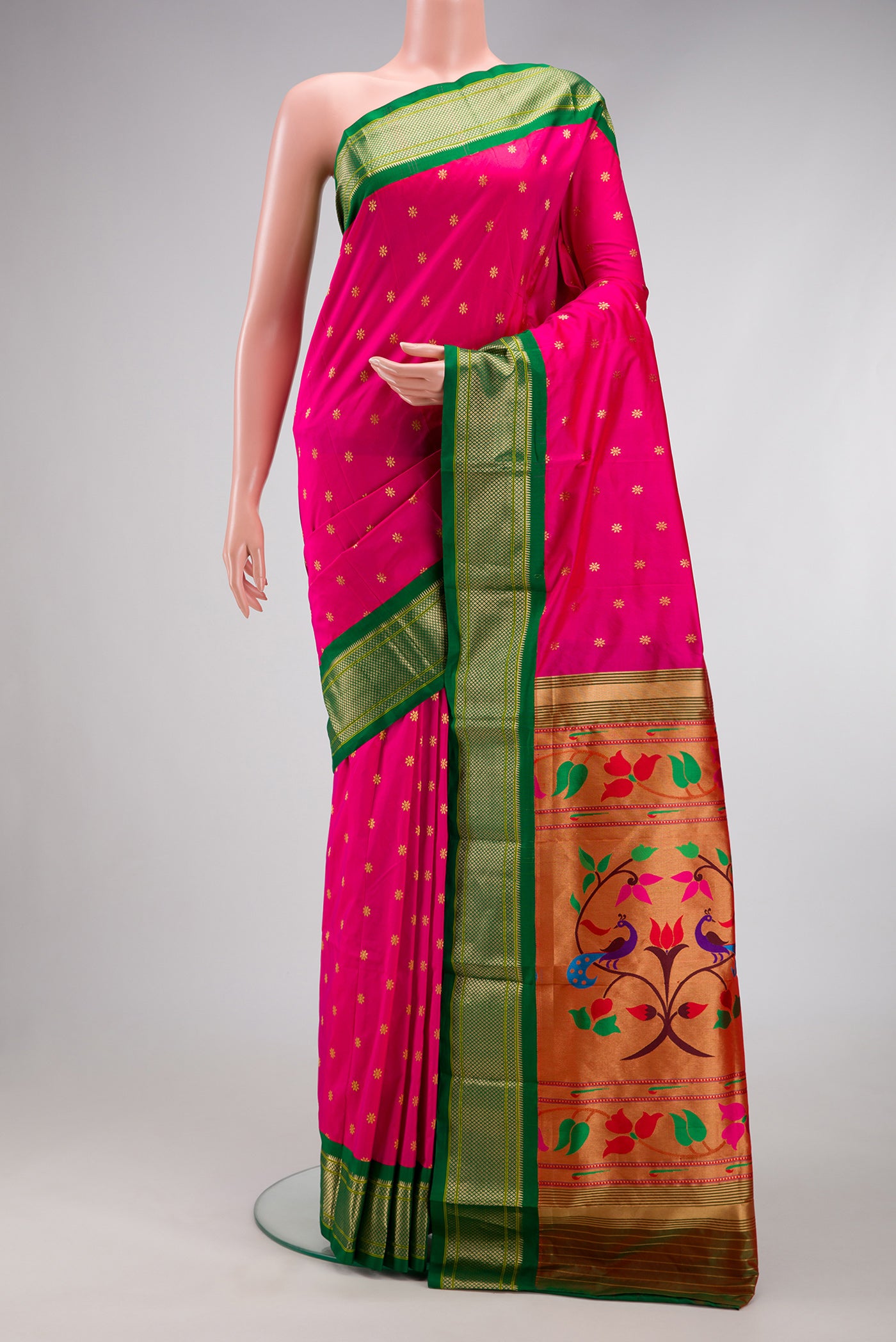 Dark Pink Paithani Silk Saree with Zari Butta on the body and Zari Border.  displayed on a mannequin