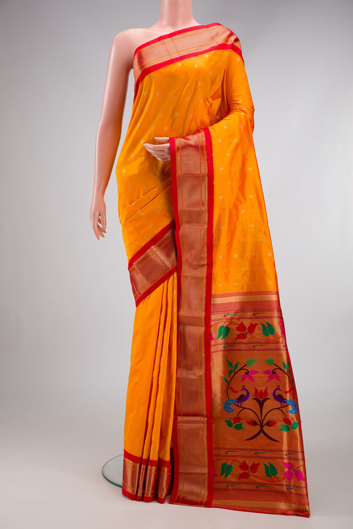 Yellow Dual Tone Paithani Silk Saree with Zari Butta on the body and Zari Border.  displayed on a mannequin