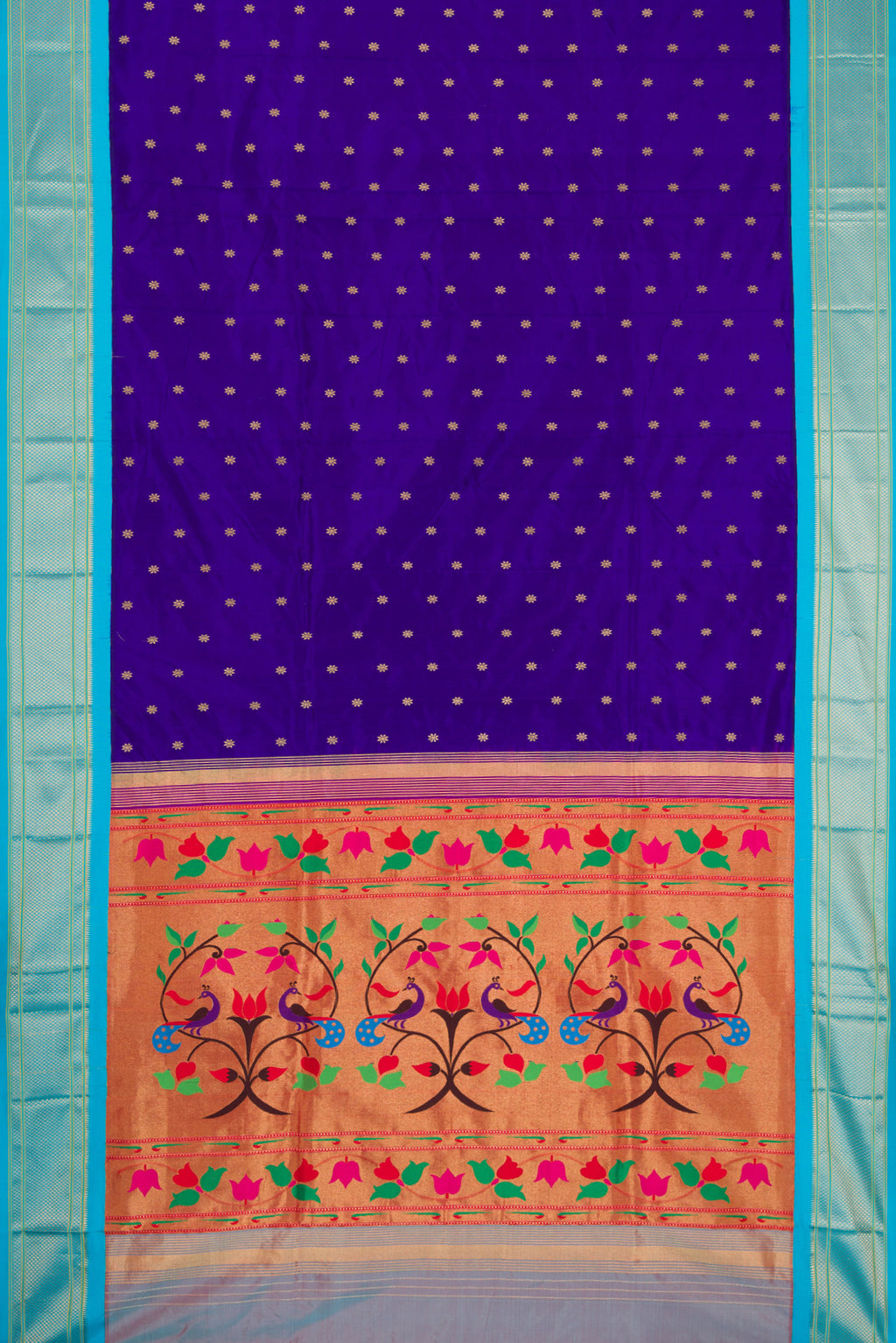 Flat view of Royal Blue Paithani Silk Saree with Zari Butta on the body and Zari Border. 