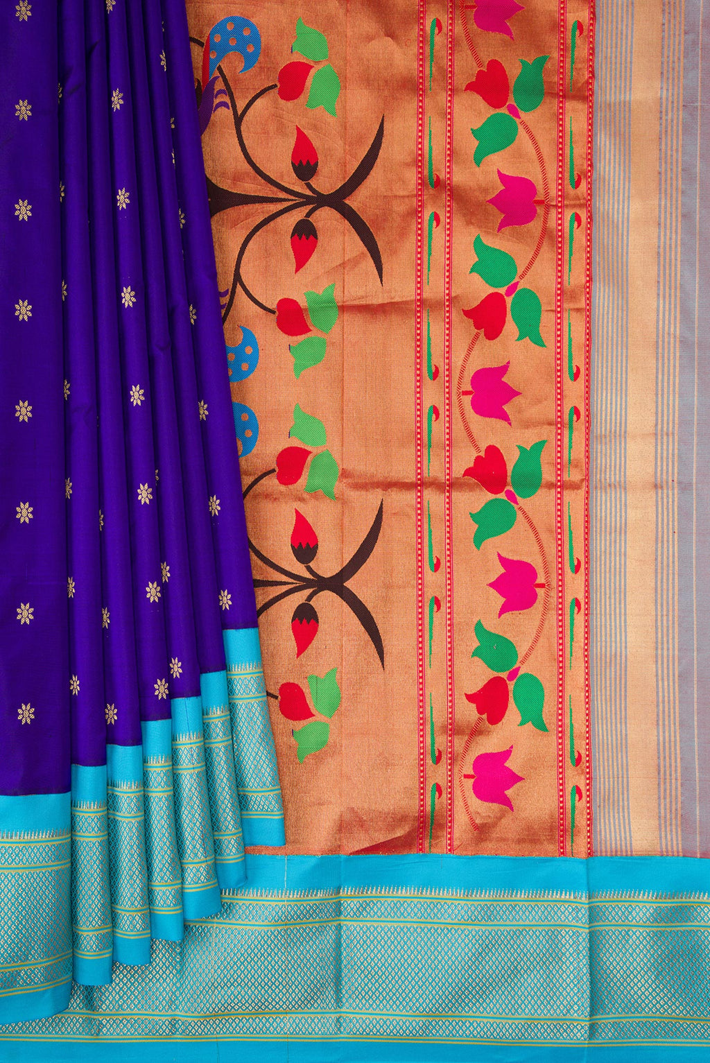 Pleats and pallu of Royal Blue Paithani Silk Saree with Zari Butta on the body and Zari Border. 