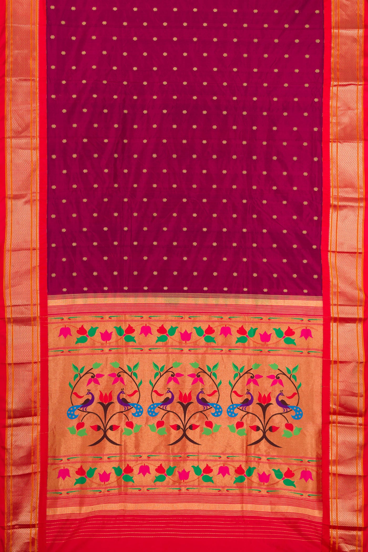 Flat view of Magenta Paithani Silk Saree with Zari Butta on the body and Zari Border. 