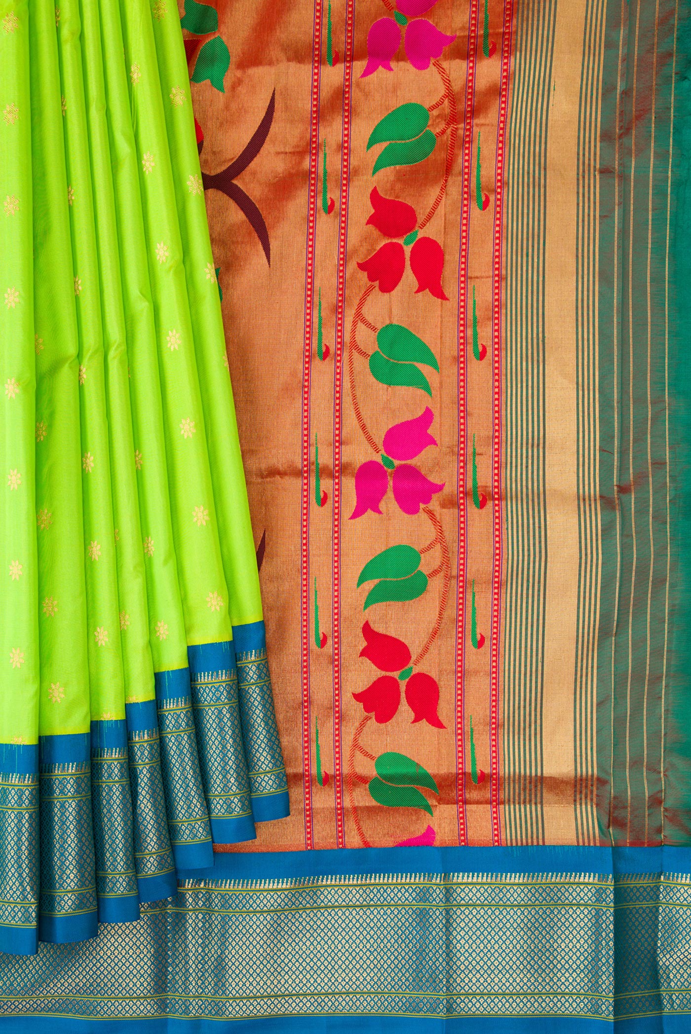 Pleats and pallu of Parrot Green Paithani Silk Saree with Zari Butta on the body and Zari Border. 