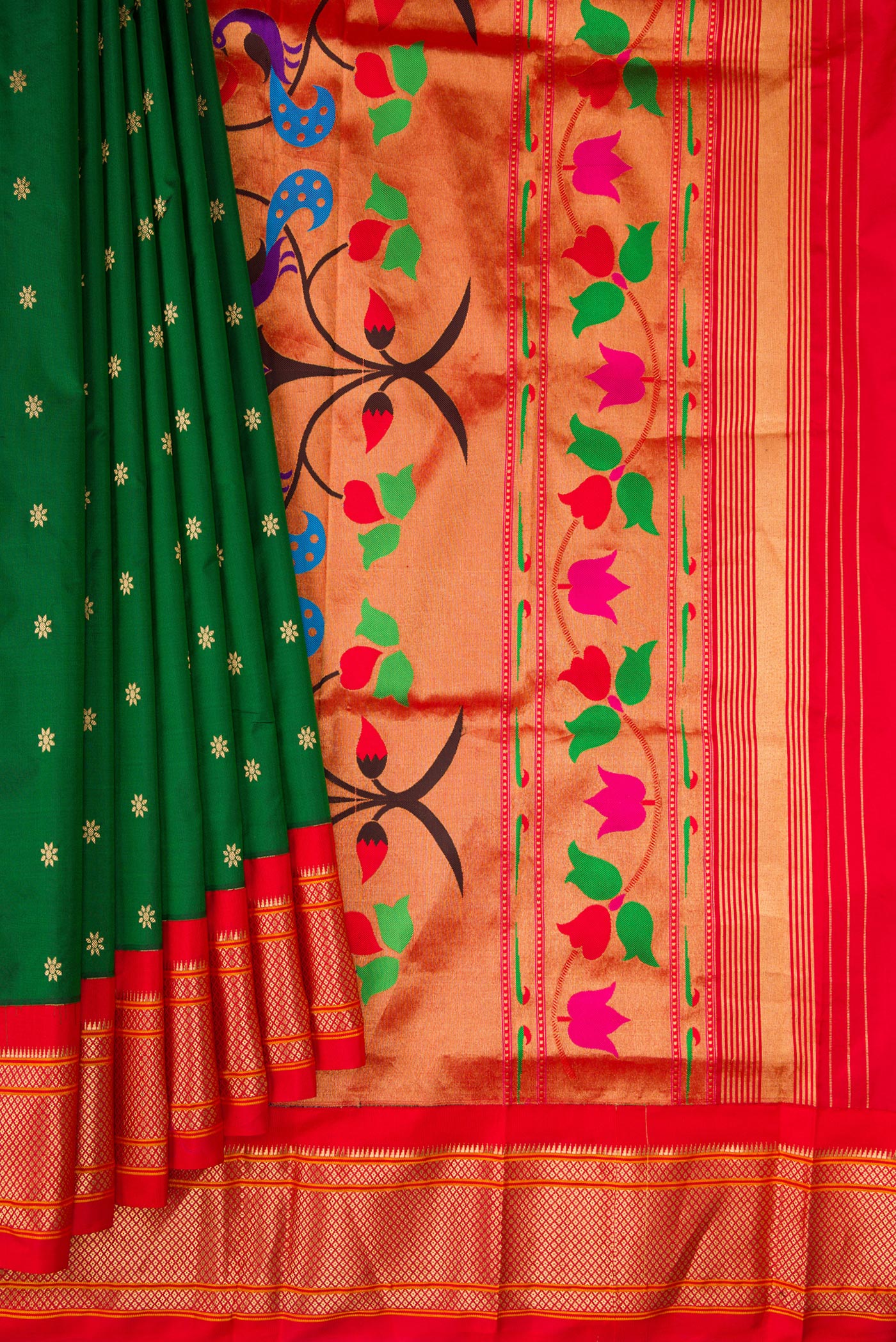 Pleats and pallu of Bottle Green Paithani Silk Saree with Zari Butta on the body and Zari Border. 