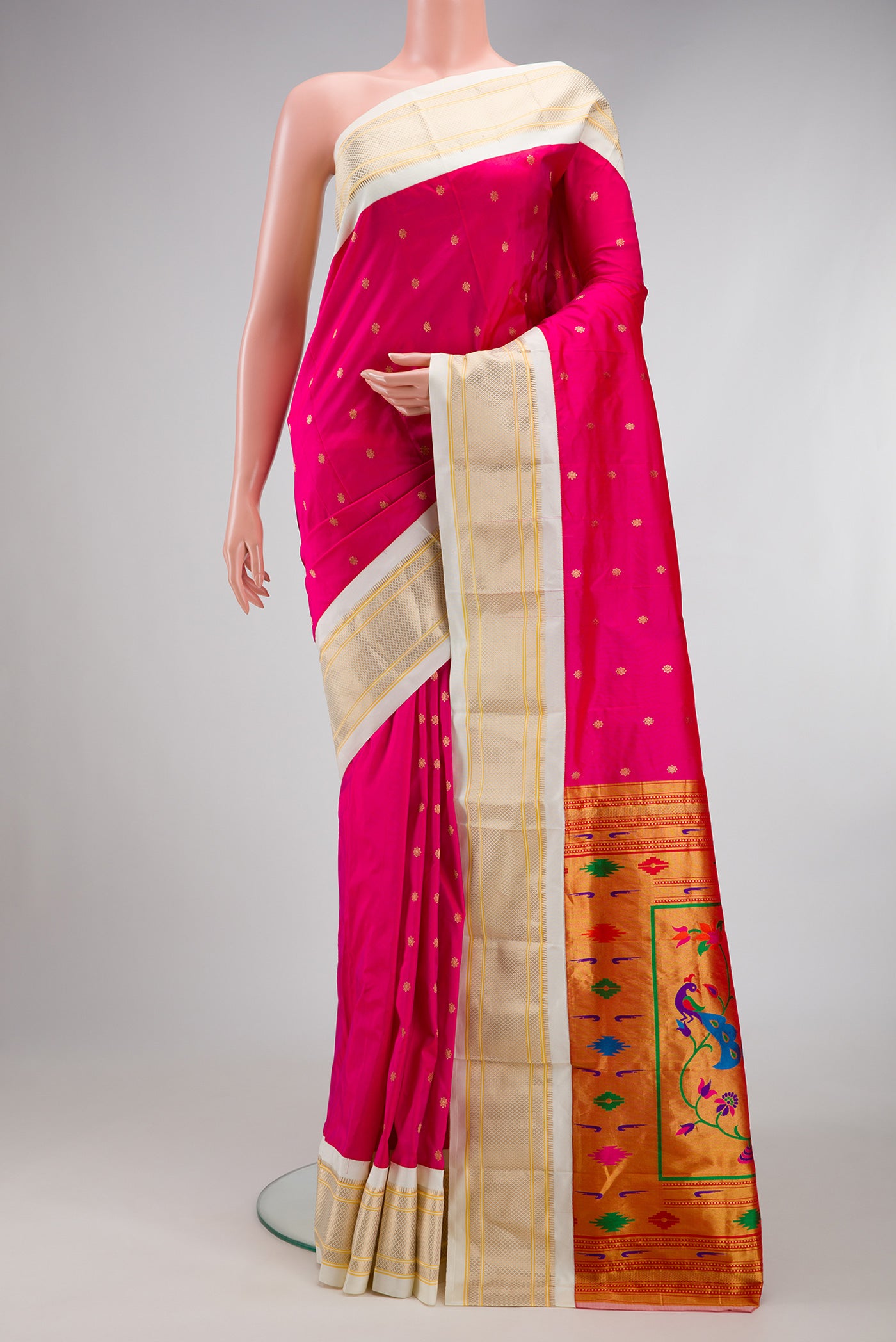 Pink Paithani Silk Saree with Zari Butta on the body and Zari Border.  displayed on a mannequin