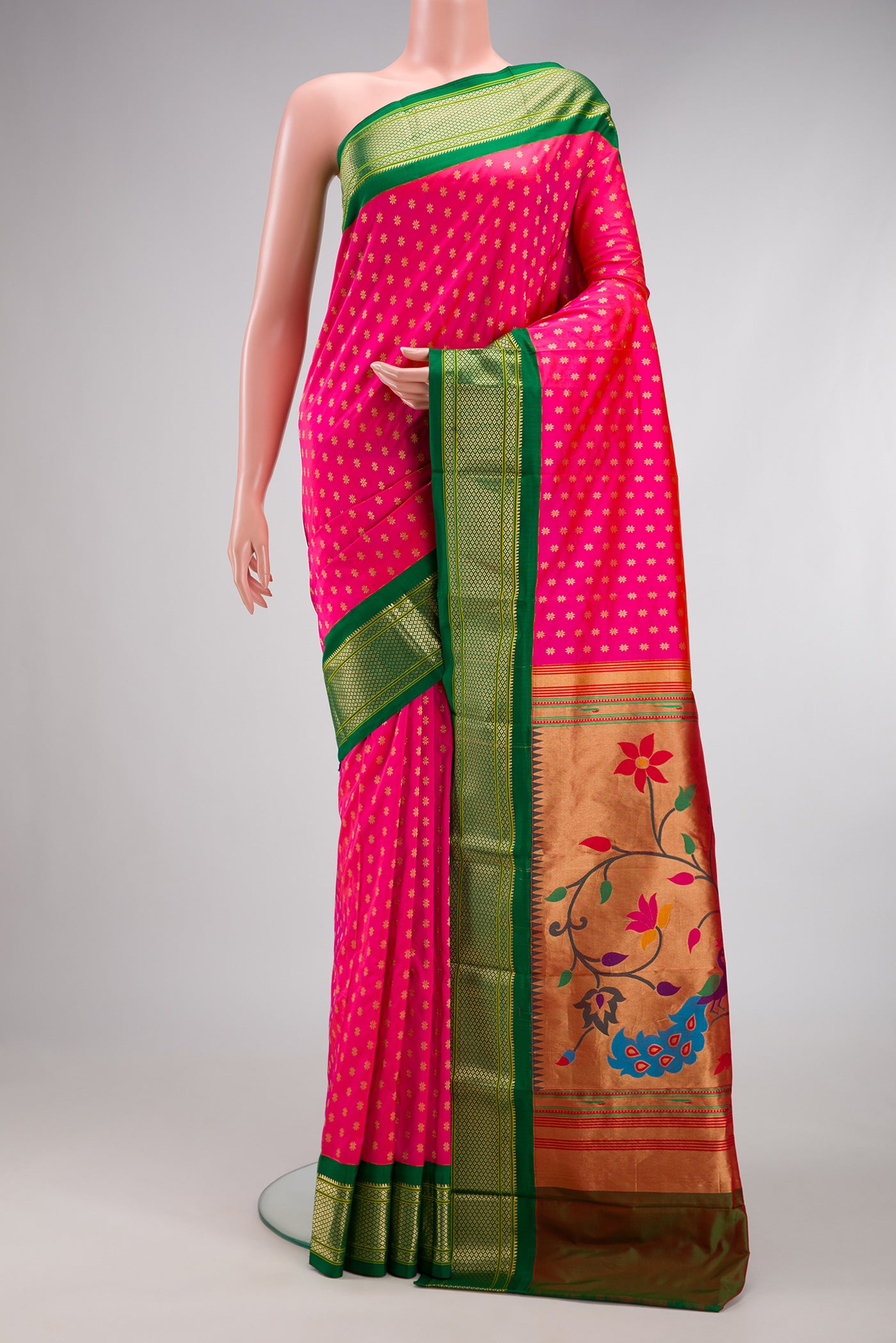 Pink Paithani Silk Saree with Zari Butta on the body and Zari Border.  displayed on a mannequin