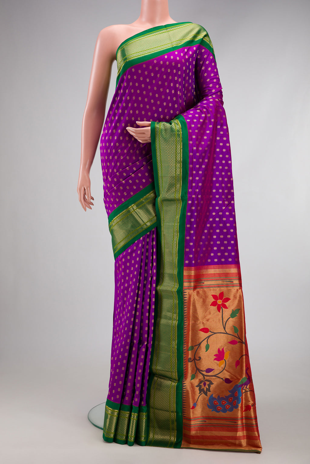 Purple Paithani Silk Saree with Zari Butta on the body and Zari Border.  displayed on a mannequin