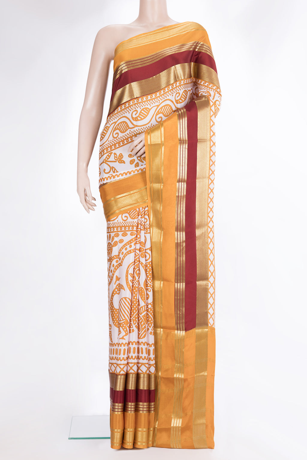 Pure Silk Off White Mysore Silk Saree with Printed design on the body and Zari Border.  displayed on a mannequin
