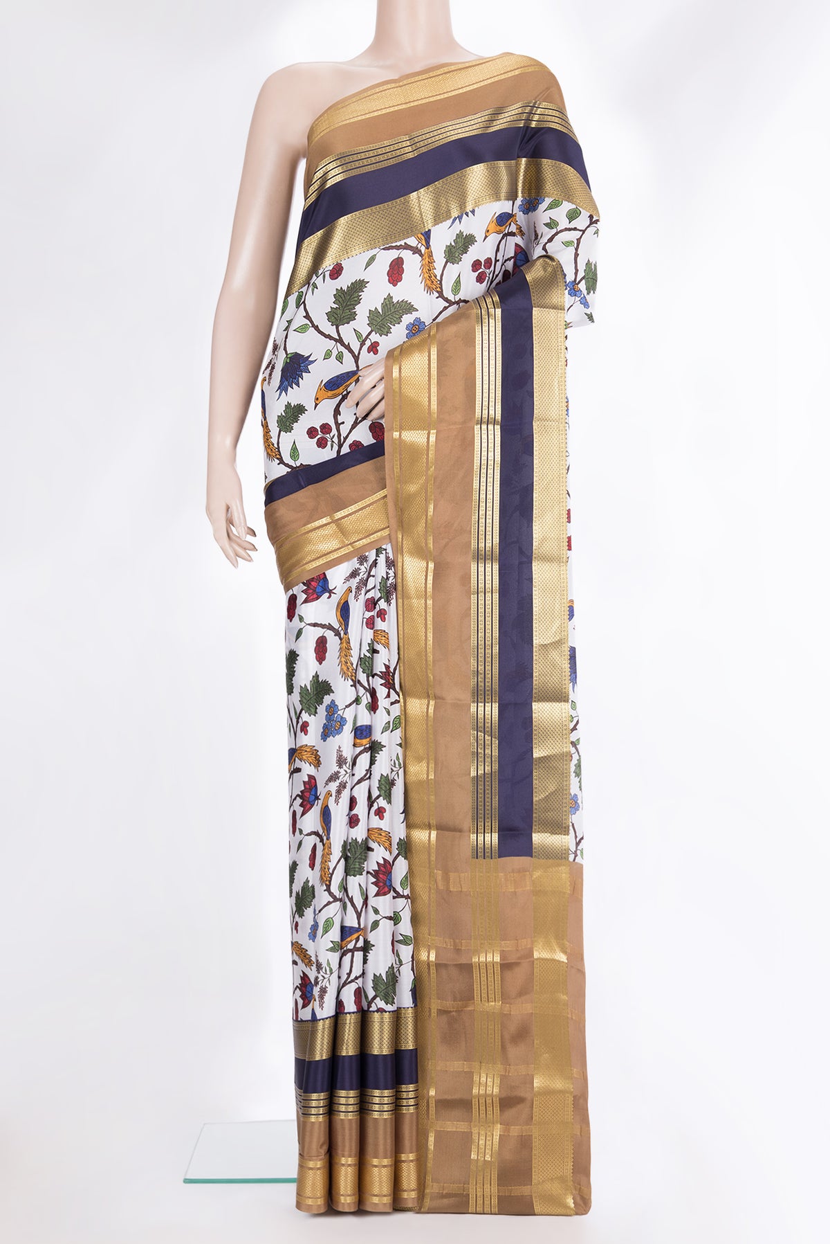 Pure Silk Off White Mysore Silk Saree with Printed design on the body and Zari Border.  displayed on a mannequin