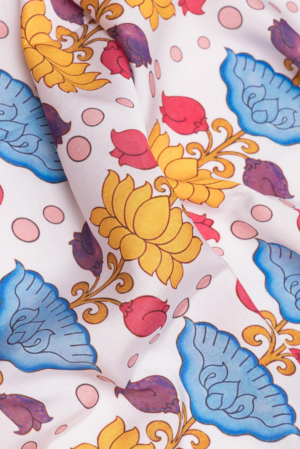 Close up of Off White Mysore Crepe Saree with Printed design on the body and Fancy Border.  displaying folds
