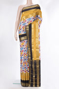 Off White Mysore Crepe Saree with Printed design on the body and Fancy Border.  displayed on a mannequin