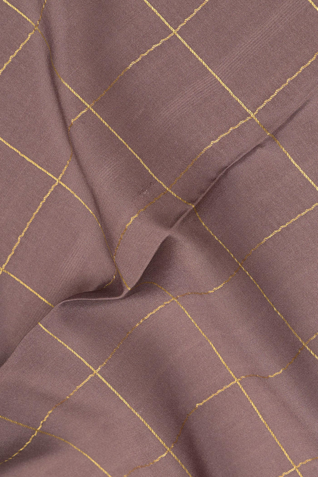 Close up of Pure Silk Brown Mysore Silk Saree with Checked design on the body and Zari Border.  displaying folds