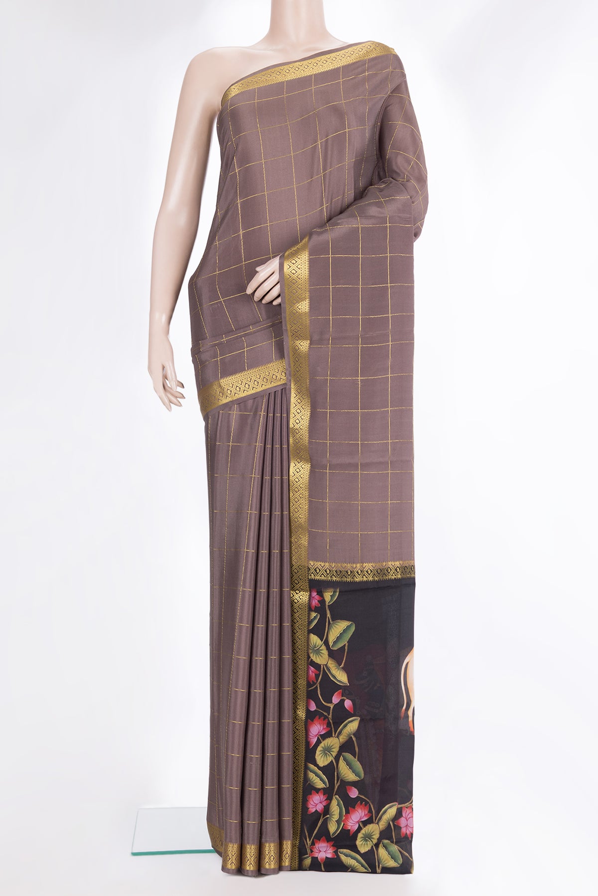 Pure Silk Brown Mysore Silk Saree with Checked design on the body and Zari Border.  displayed on a mannequin