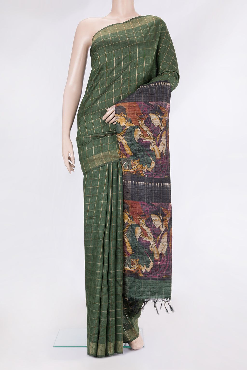 Green Tussar Silk Saree with Checked design on the body and Zari Border.  displayed on a mannequin